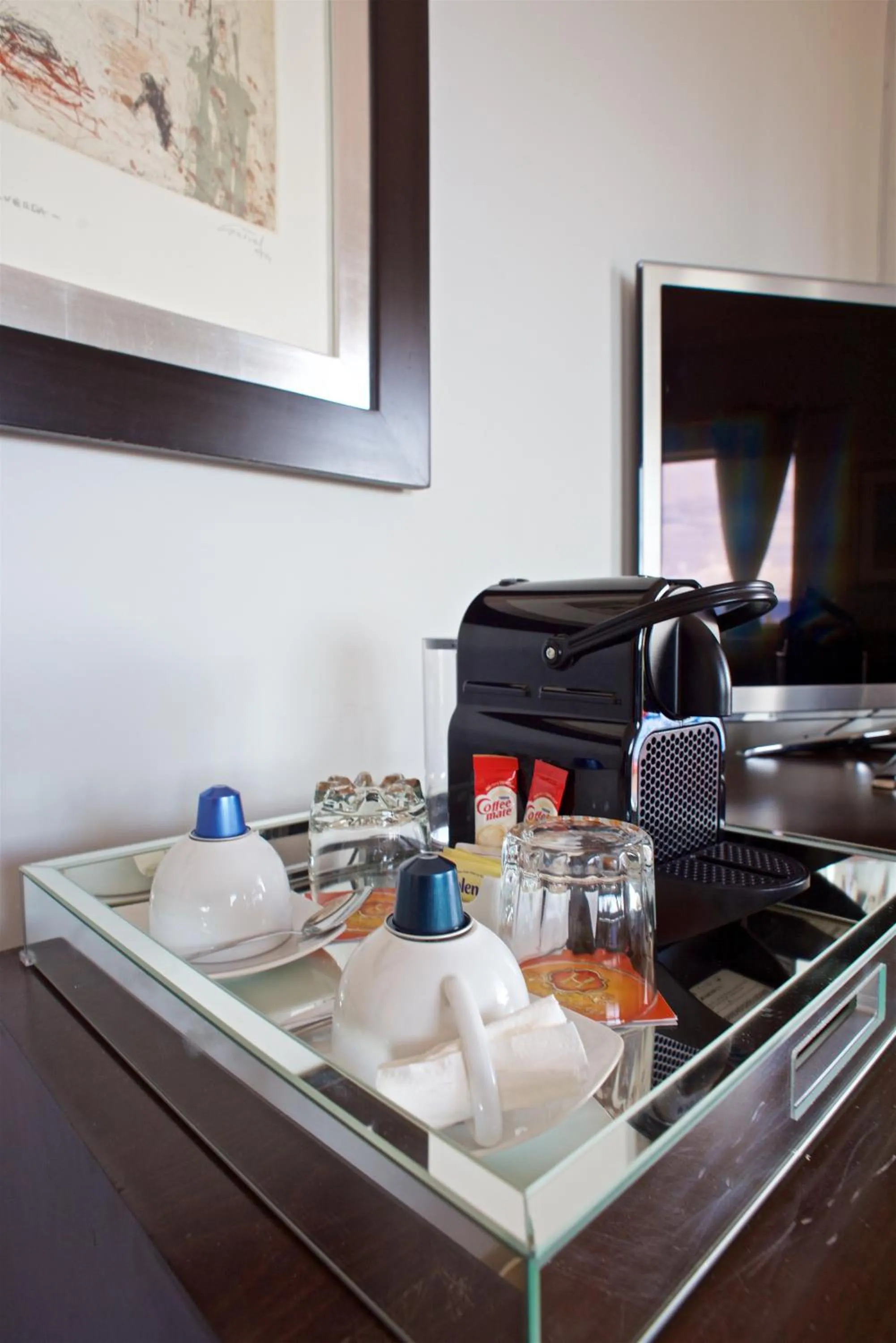 TV and multimedia in Hacienda del Lago Boutique Hotel