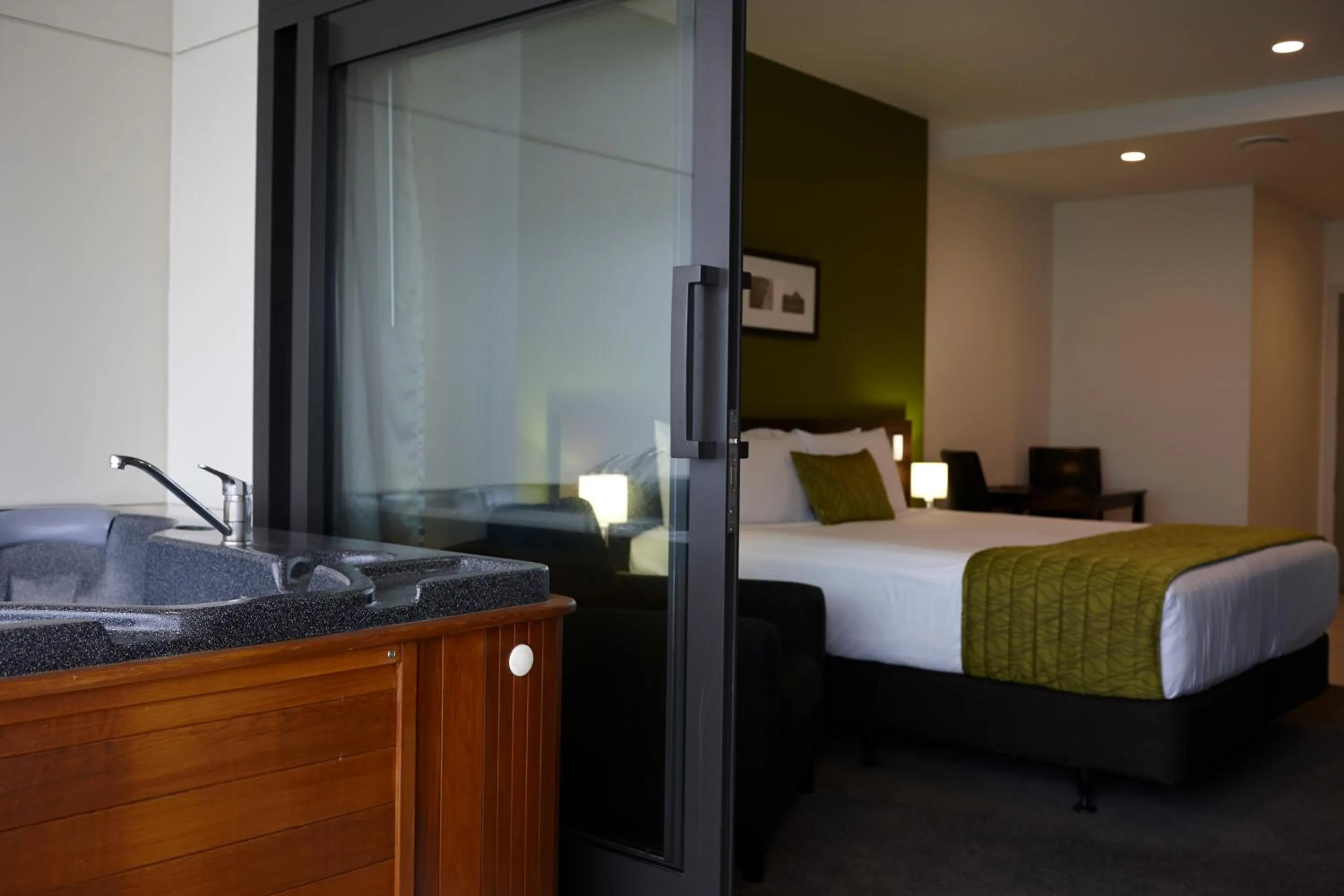 Bed in Quest Rotorua Central