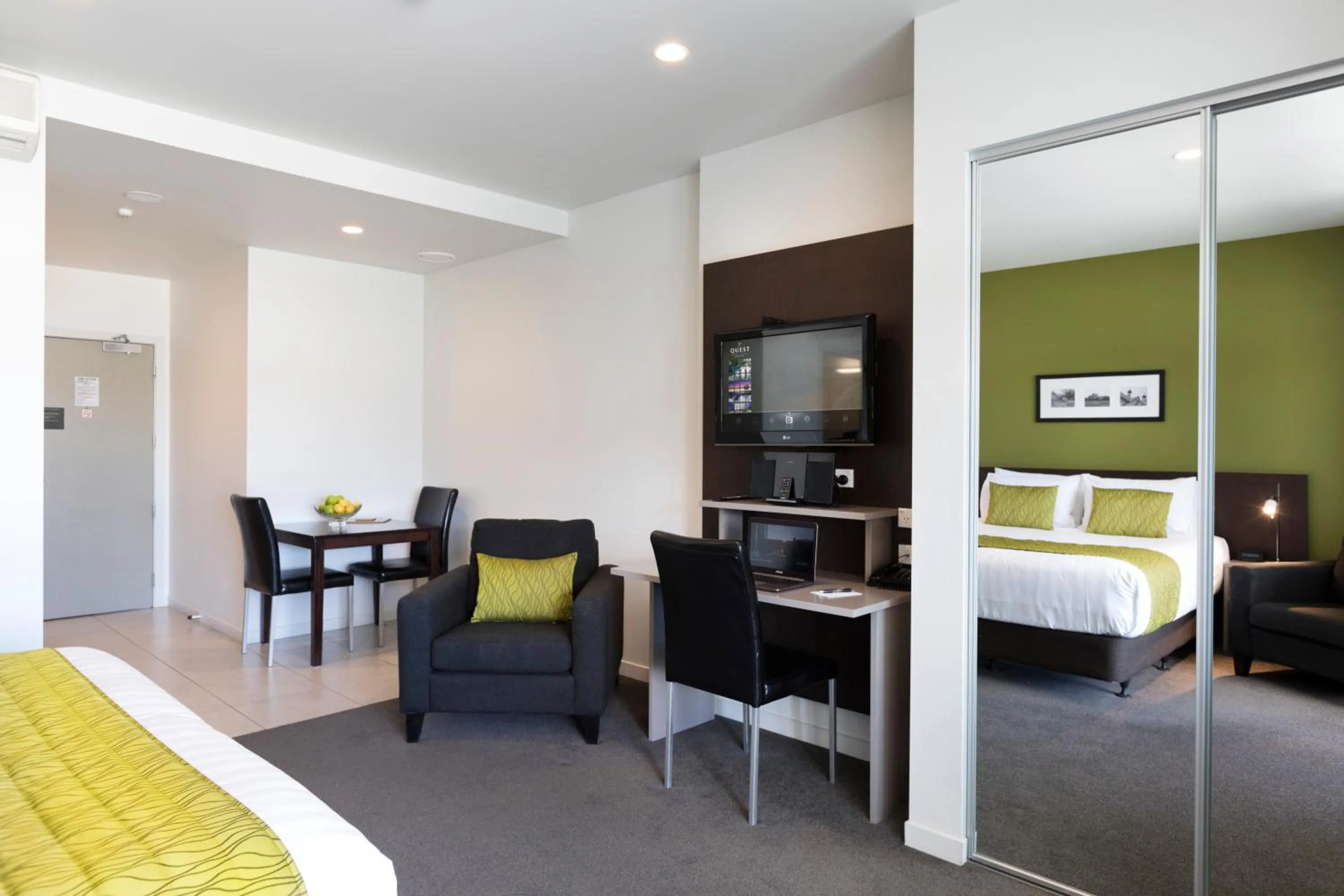 Dining area, Bed in Quest Rotorua Central