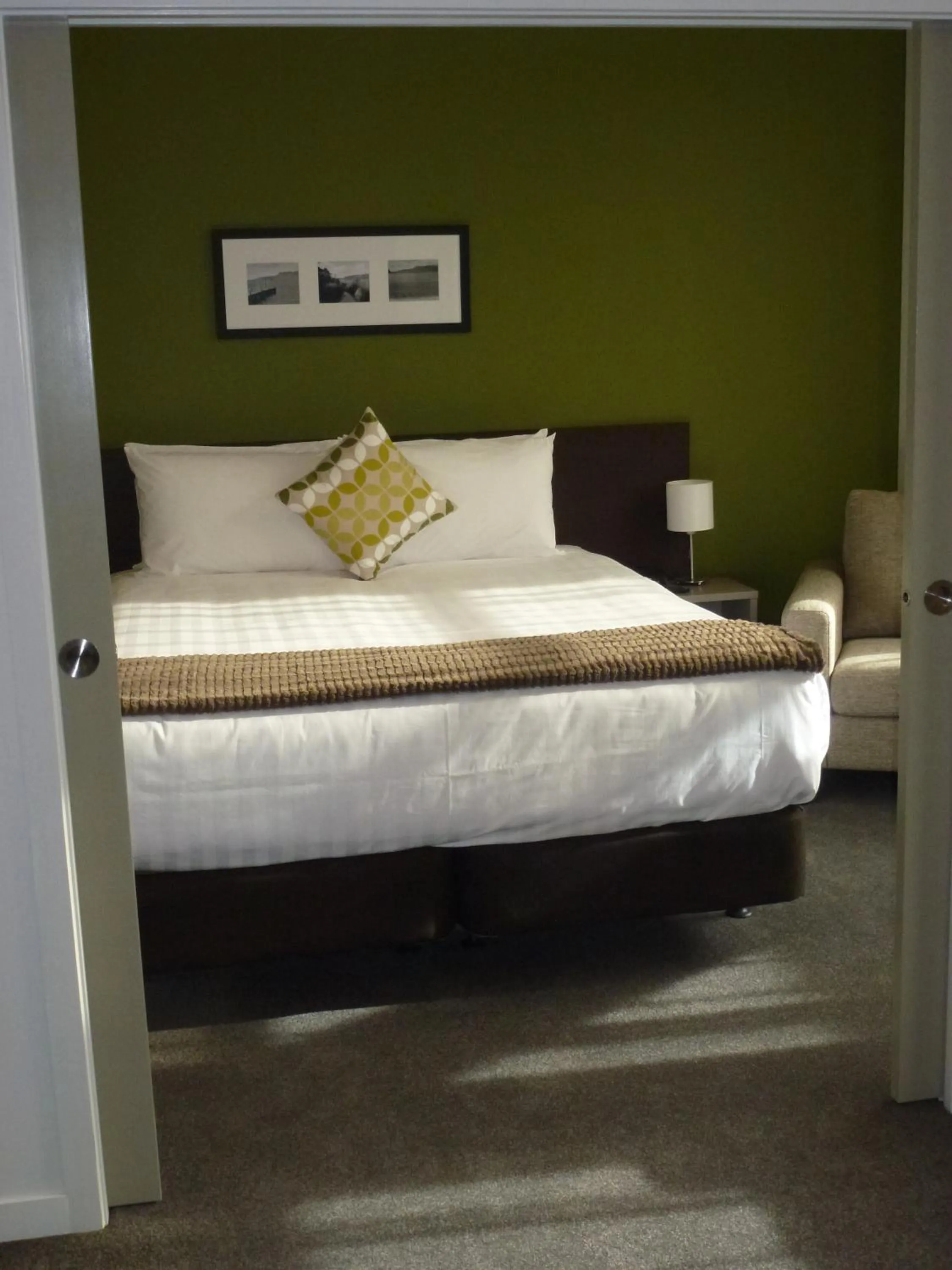 Bed in Quest Rotorua Central