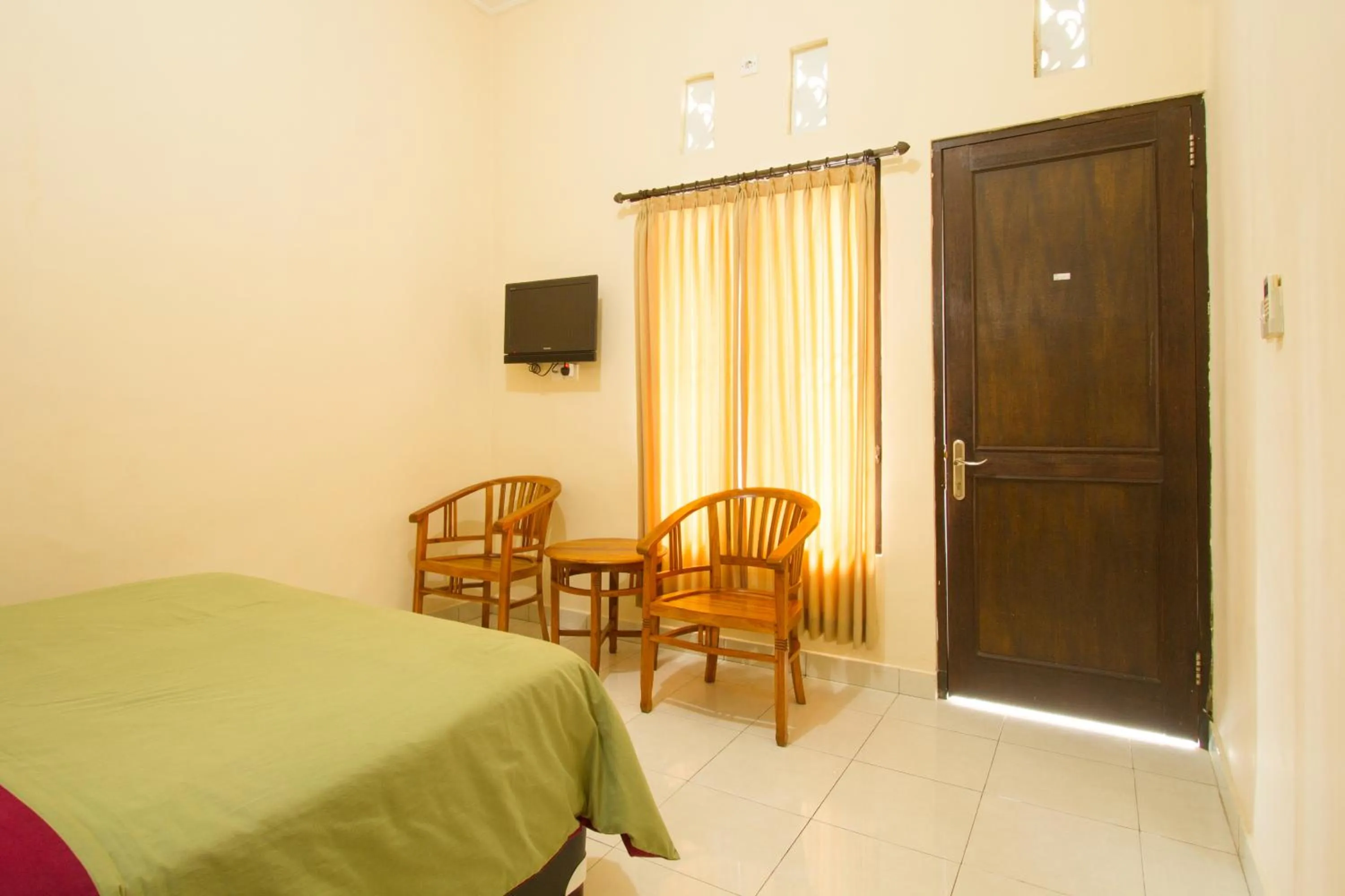 Bedroom in Seminyak Point Guest House