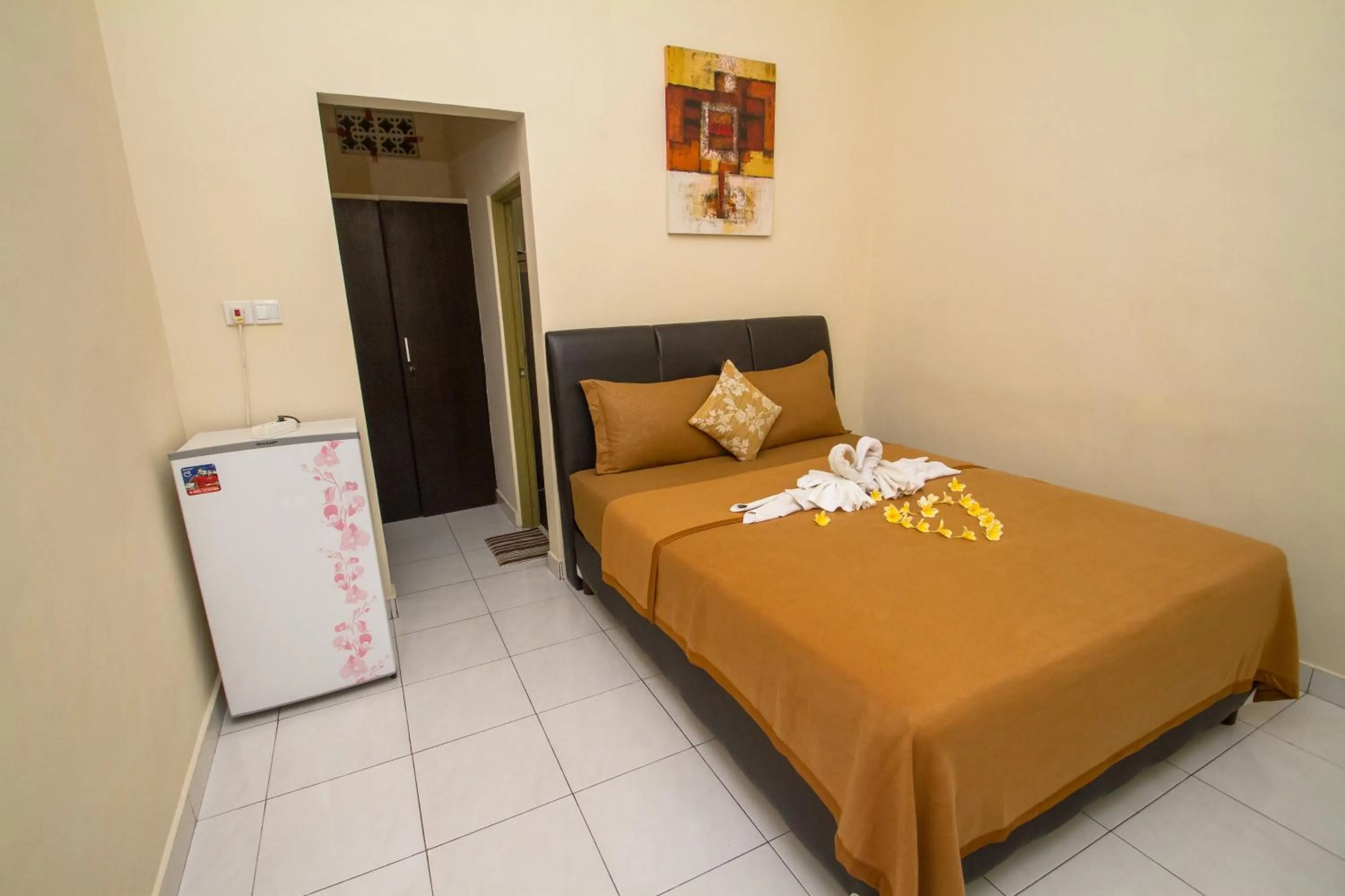 Bed in Seminyak Point Guest House