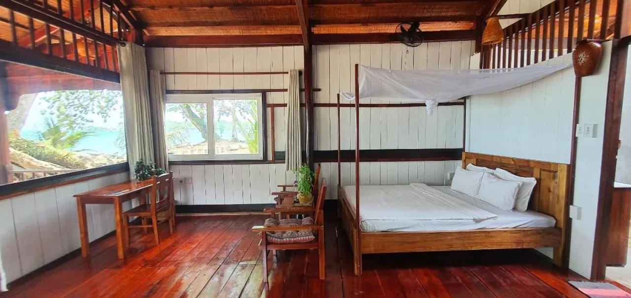 Bed in Bamboo Cottages