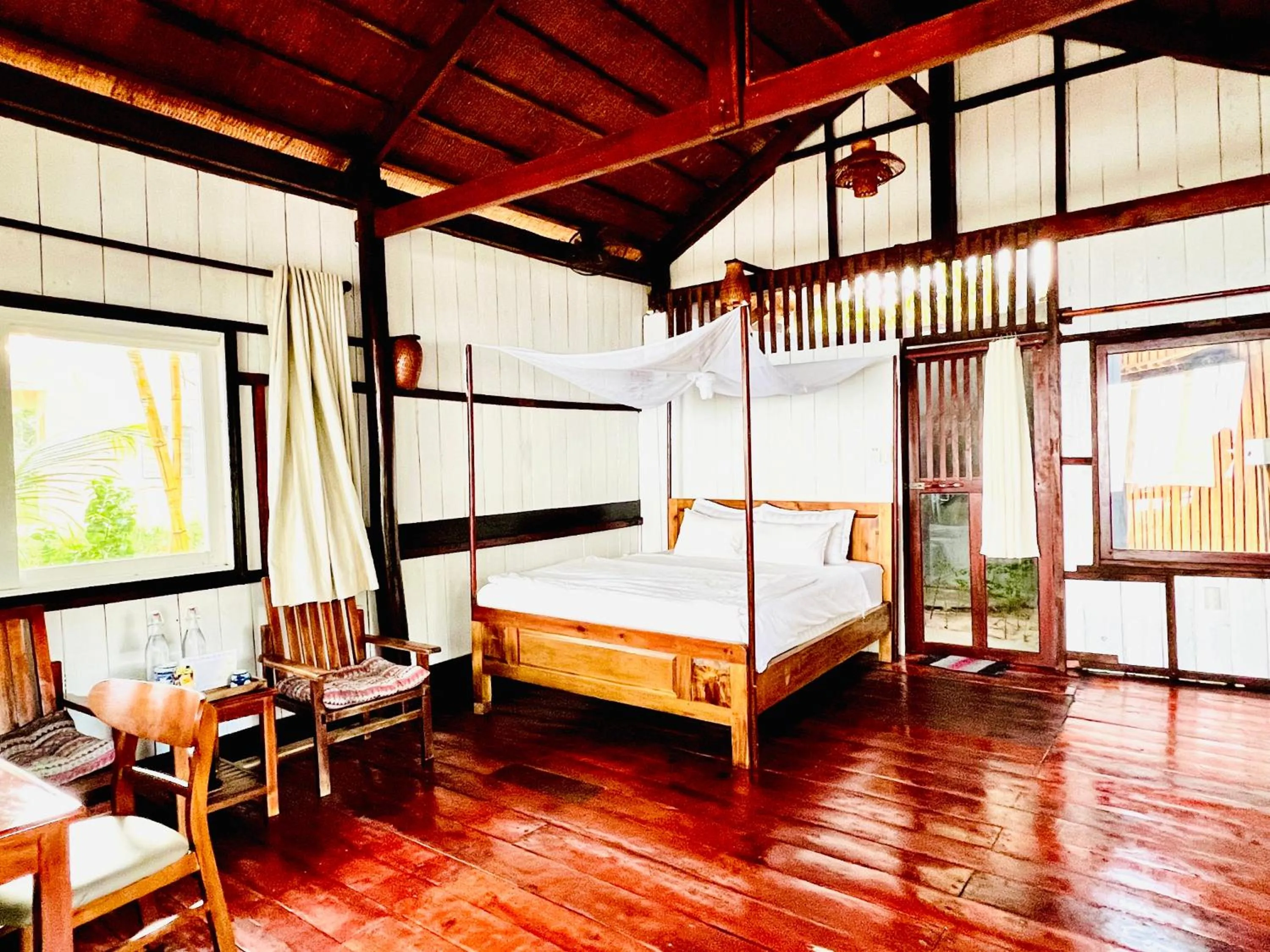 Bed in Bamboo Cottages