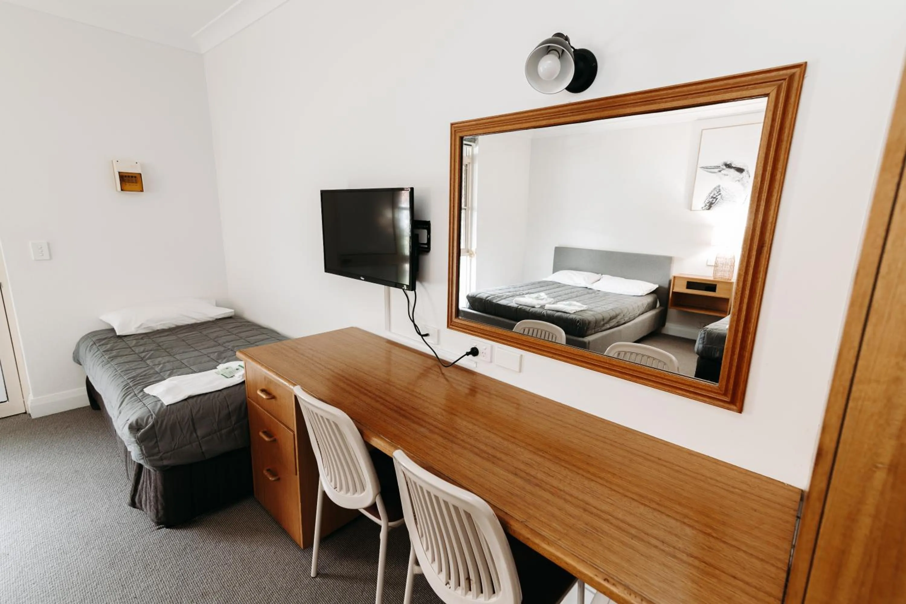 Bedroom in The Ophir Hotel