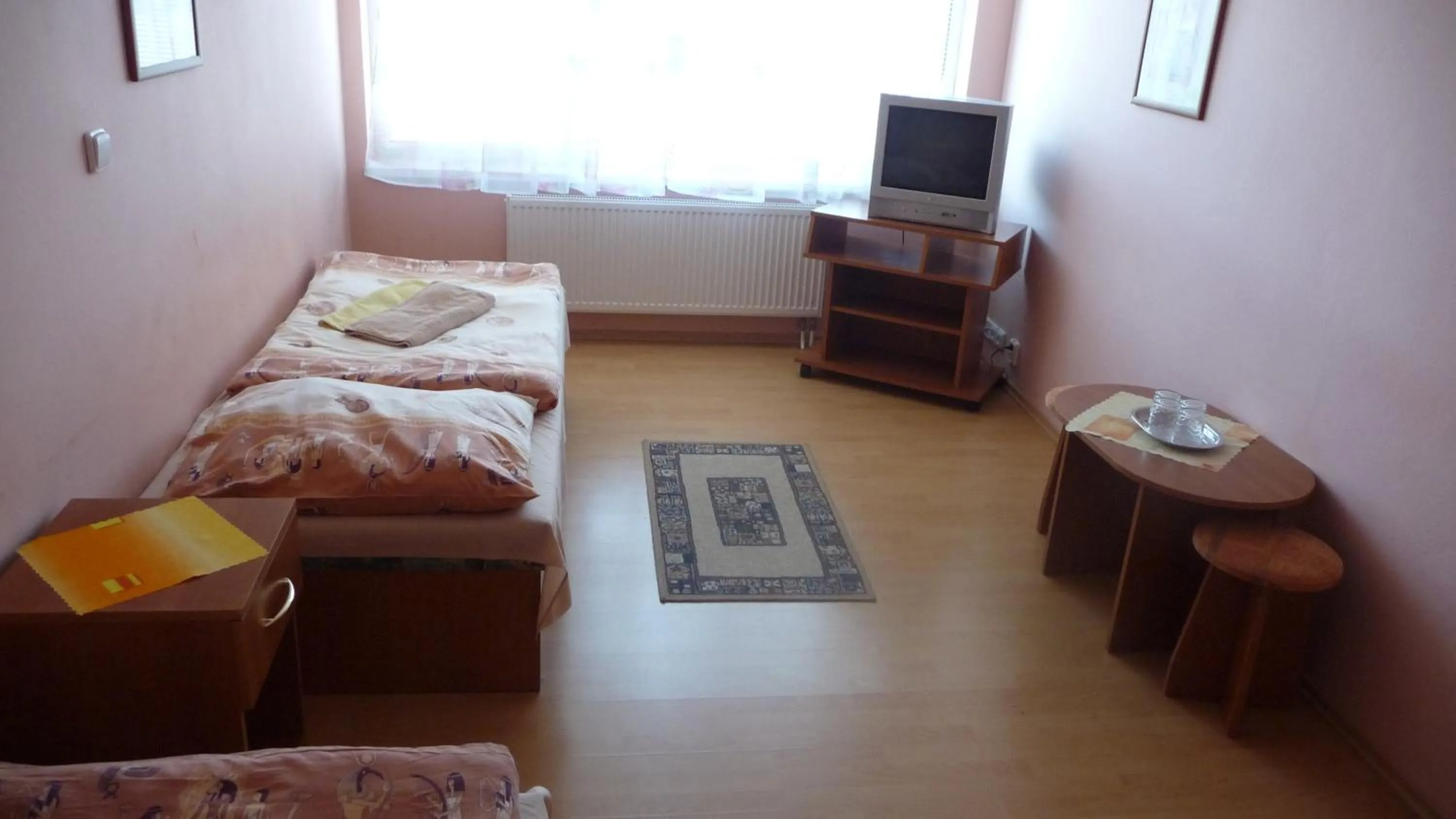 Photo of the whole room, Bed in Hotel Štadión