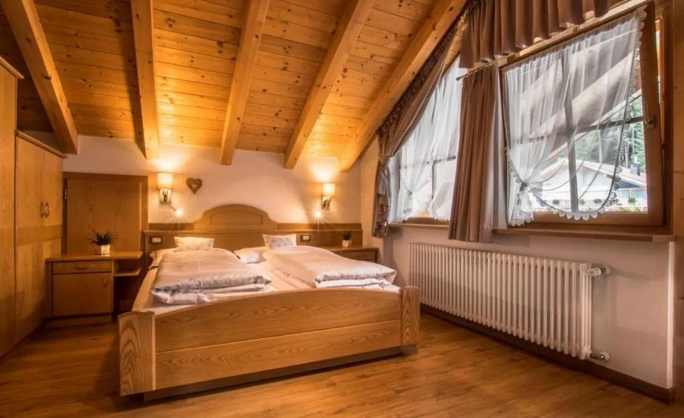 Photo of the whole room, Bed in Ciasa Montanara