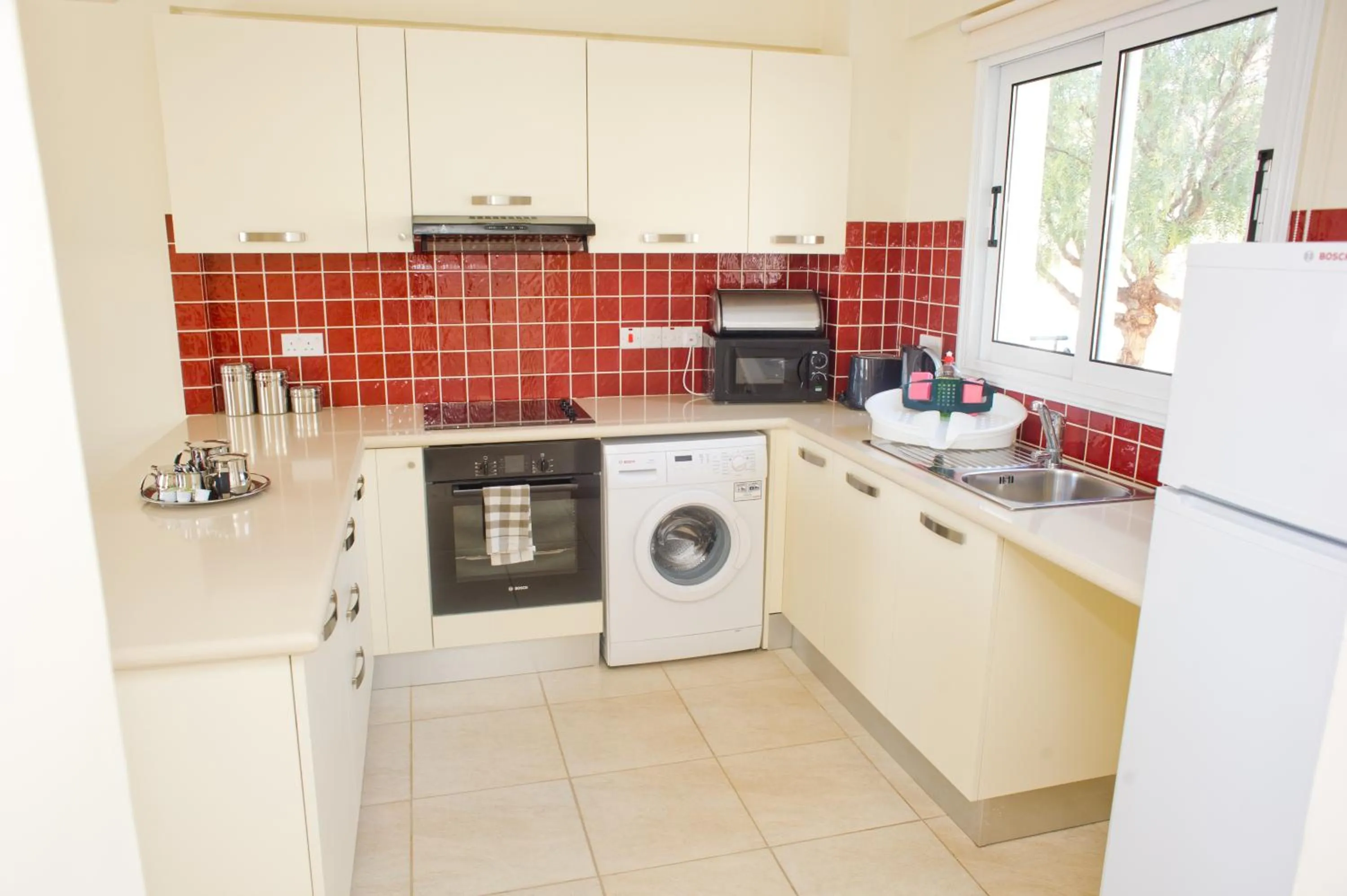 Kitchen or kitchenette in Club St. George