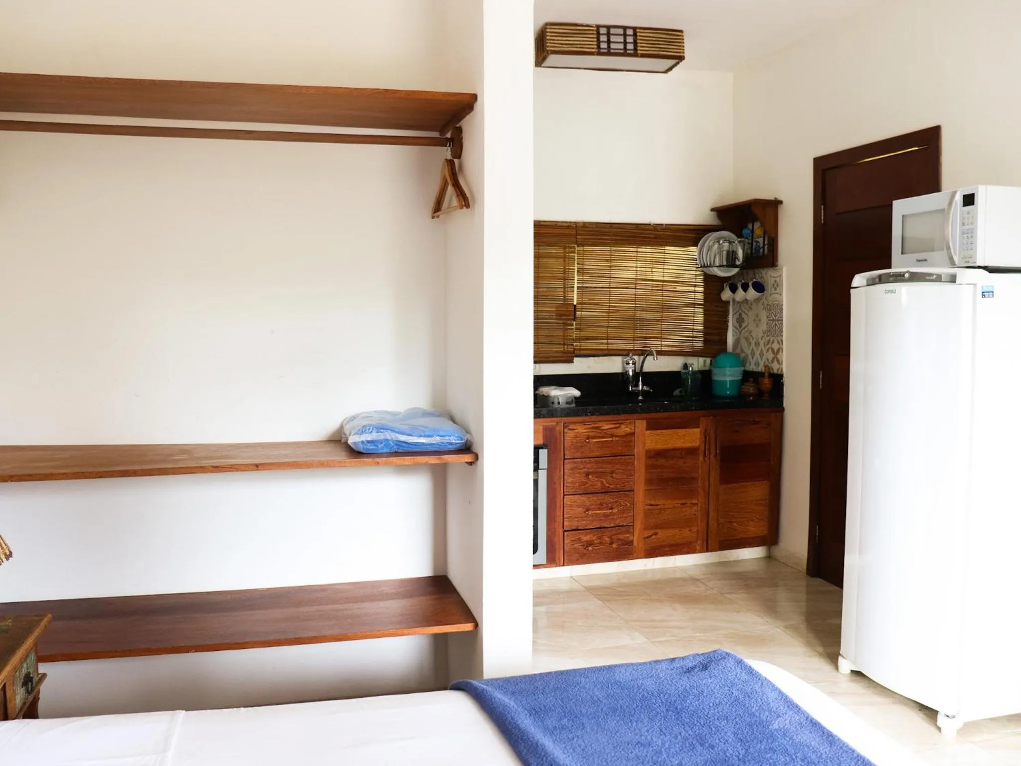 Kitchen or kitchenette in Conchas do Mar Residence