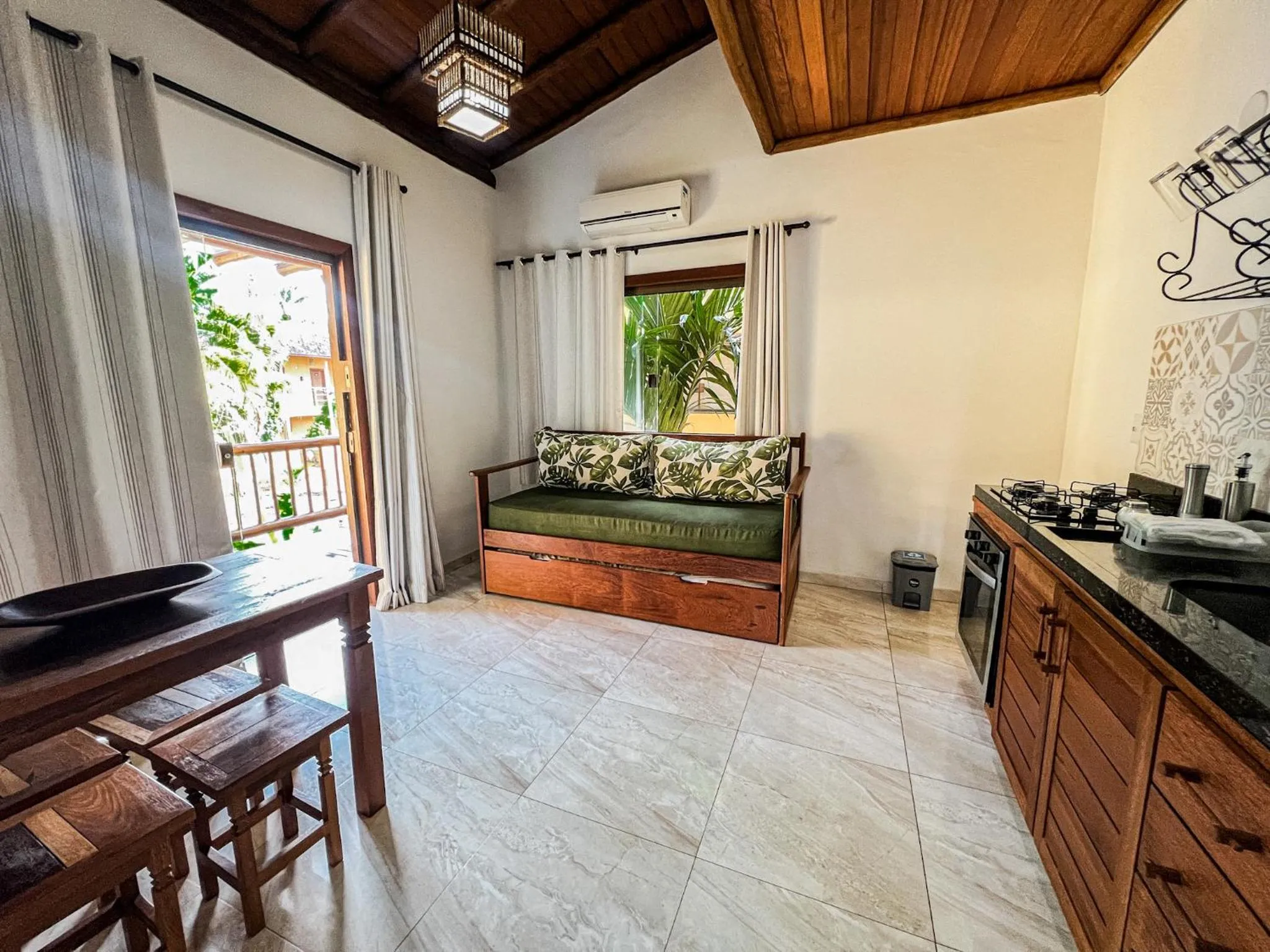 Kitchen or kitchenette in Conchas do Mar Residence