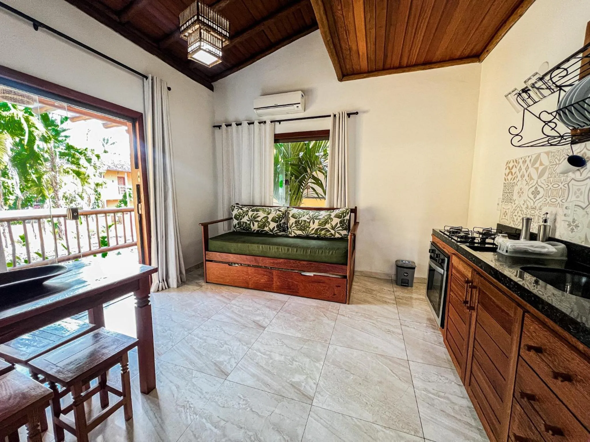 Kitchen or kitchenette in Conchas do Mar Residence