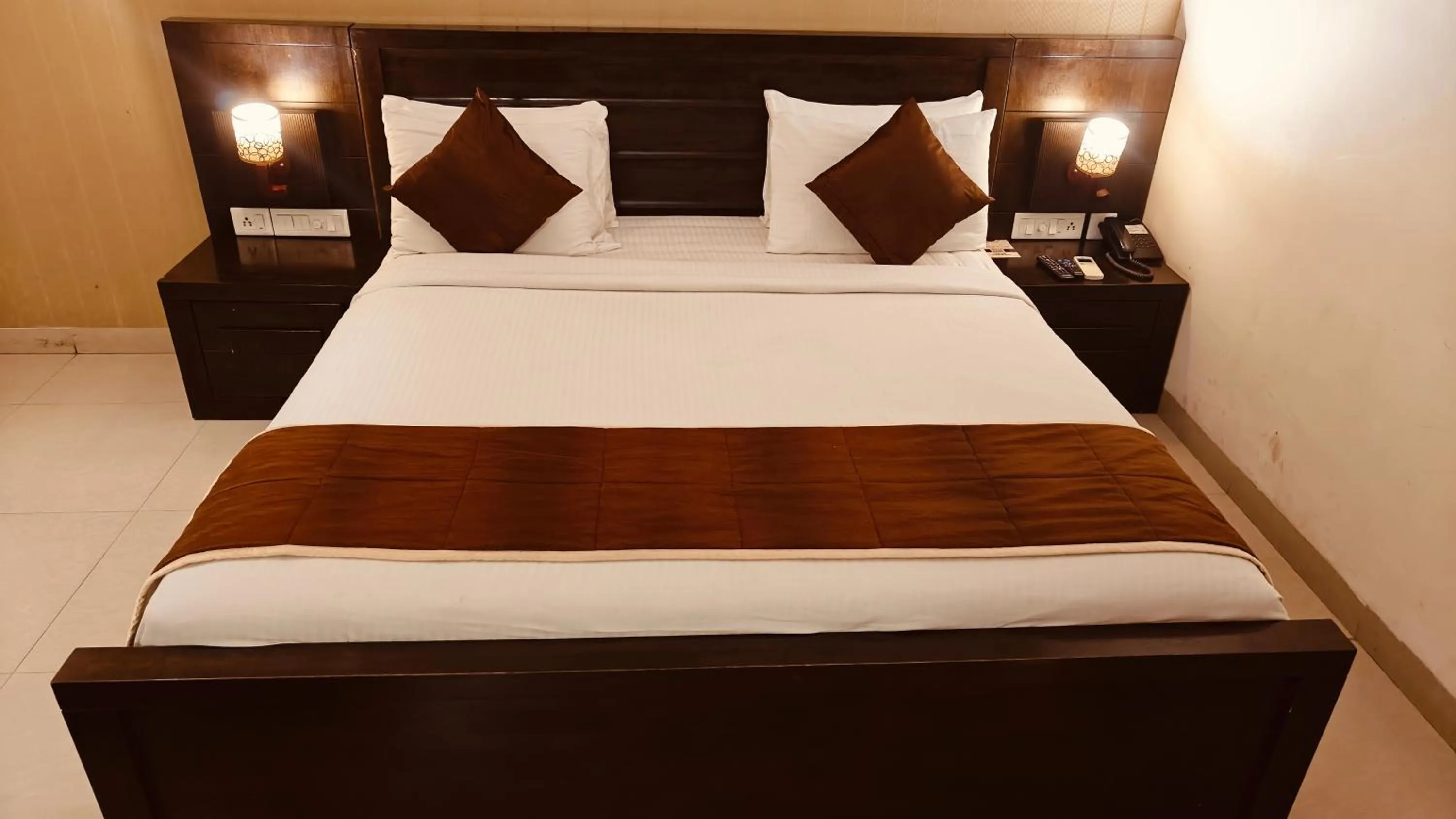 Bed in Alps Residency - A Bergamont Hotel, Krishnagiri