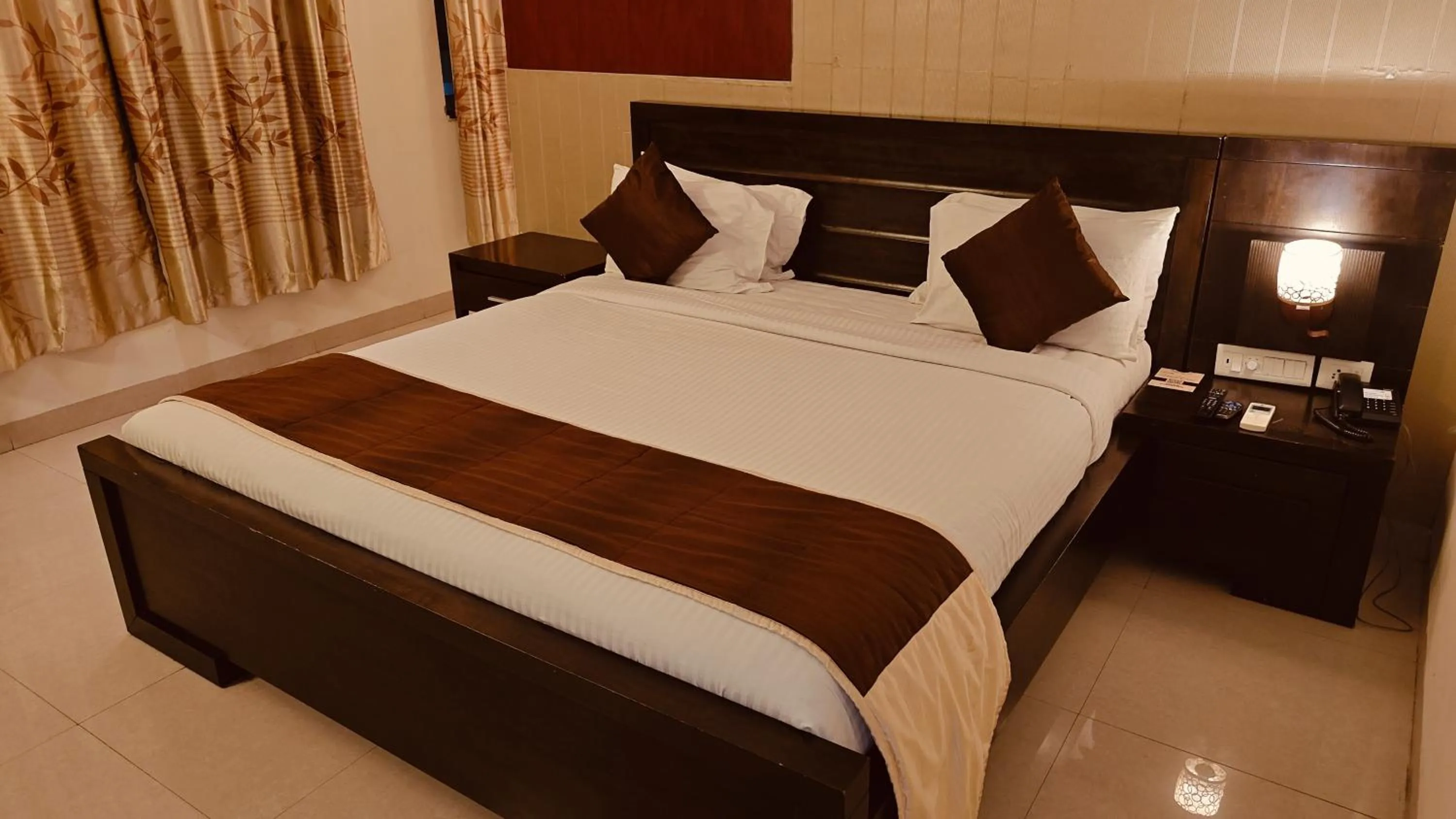 Bed in Alps Residency - A Bergamont Hotel, Krishnagiri