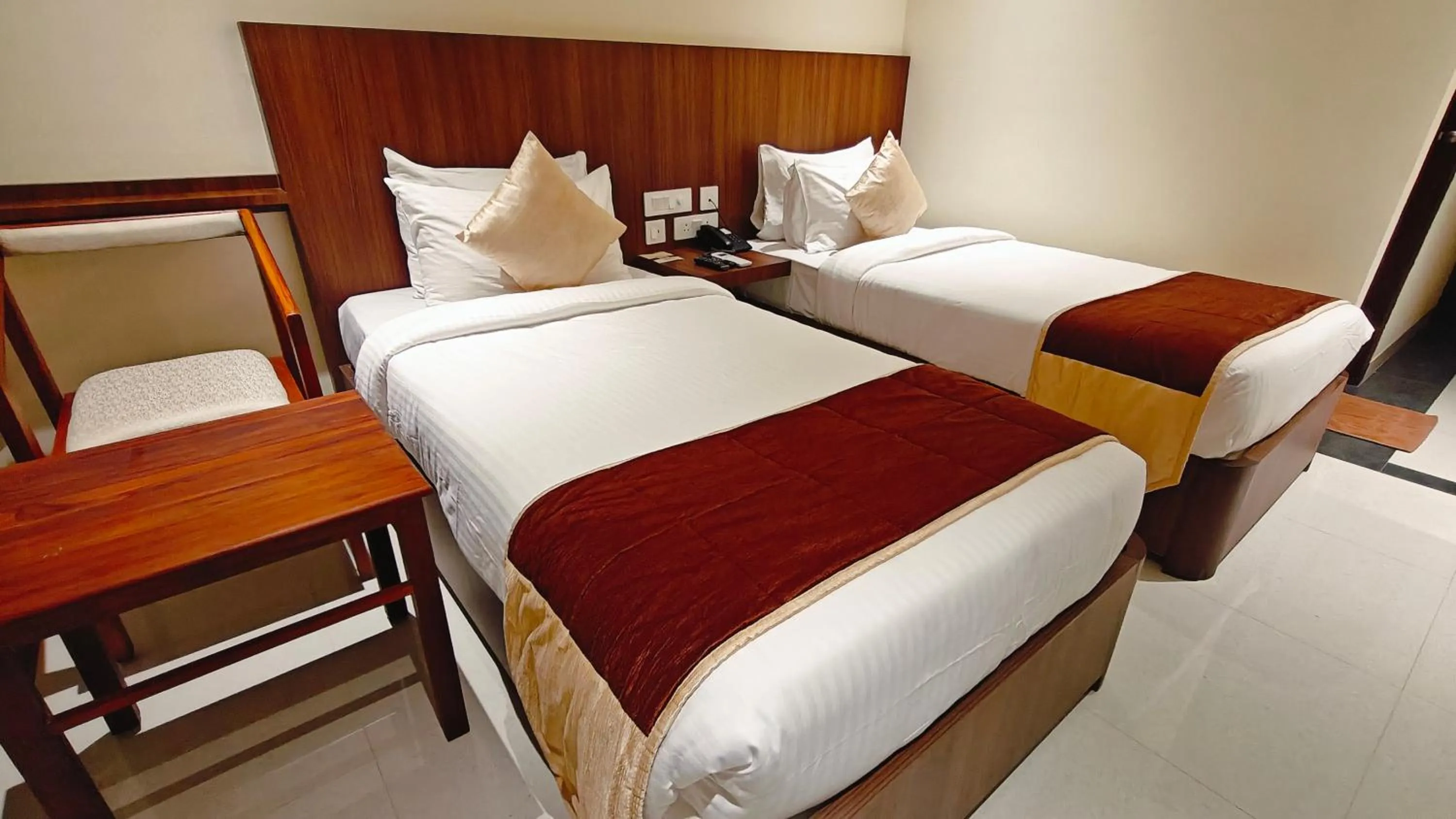 Bed in Alps Residency - A Bergamont Hotel, Krishnagiri