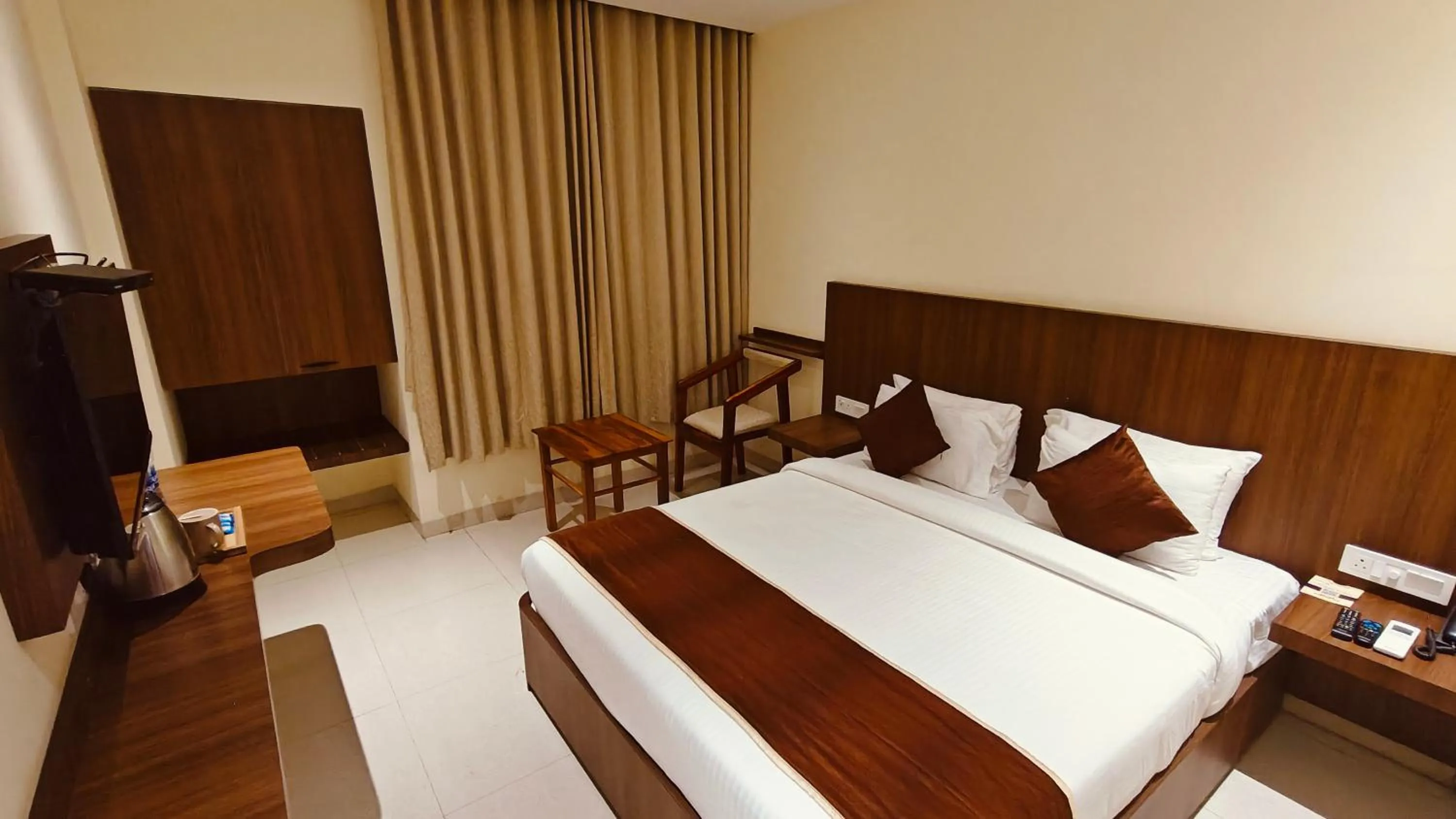 Bed in Alps Residency - A Bergamont Hotel, Krishnagiri