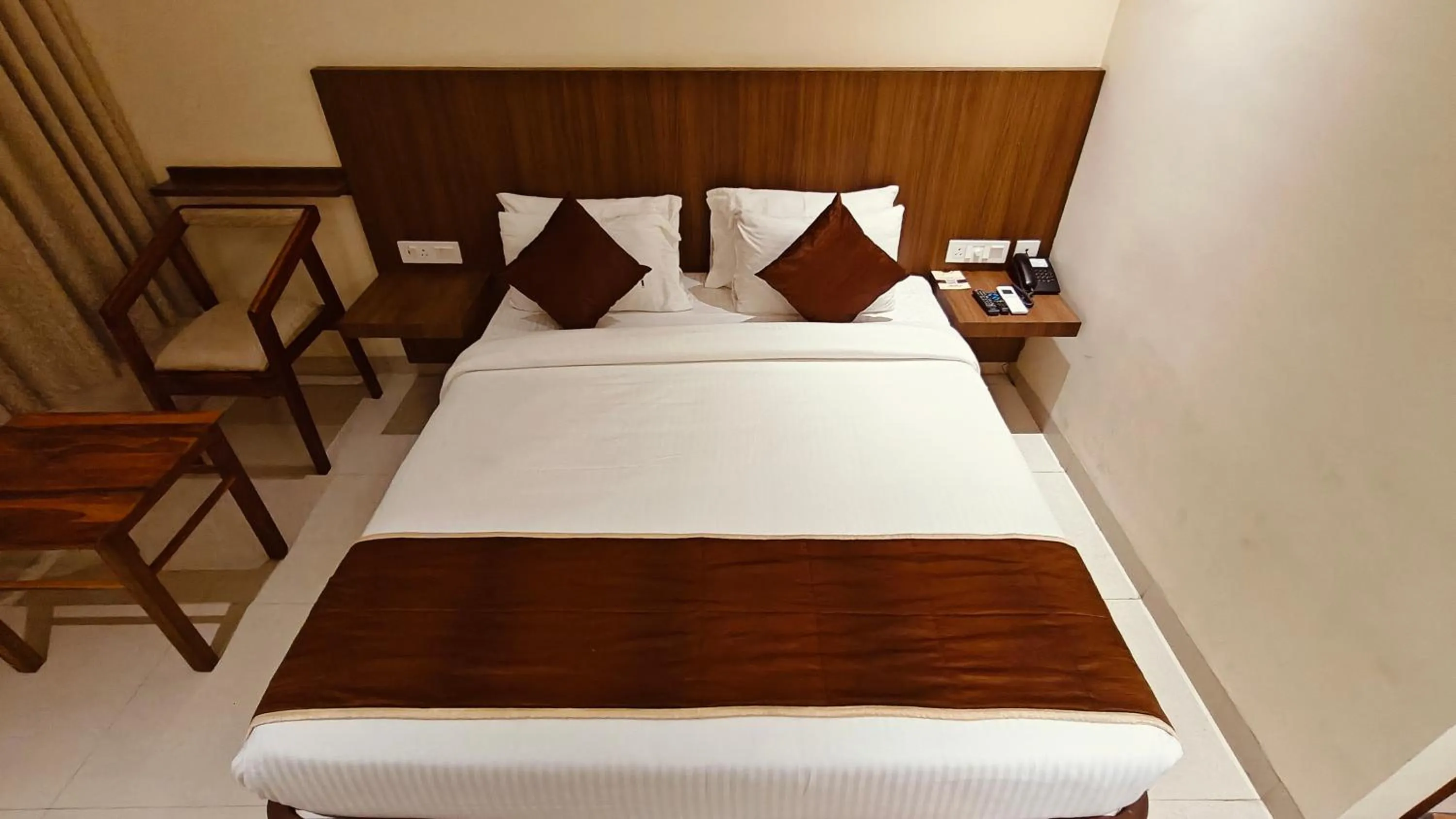 Bed in Alps Residency - A Bergamont Hotel, Krishnagiri