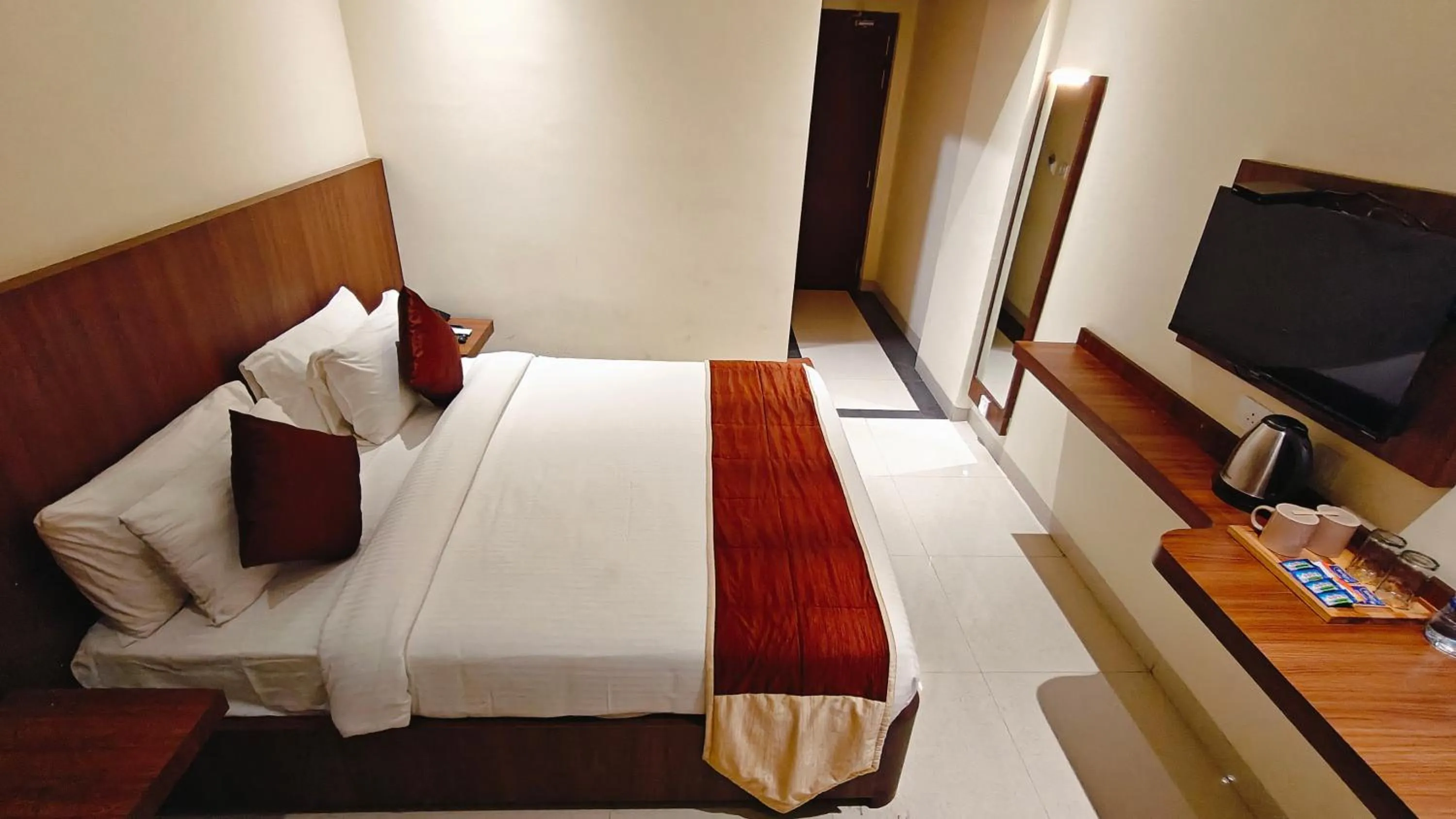 Bed in Alps Residency - A Bergamont Hotel, Krishnagiri