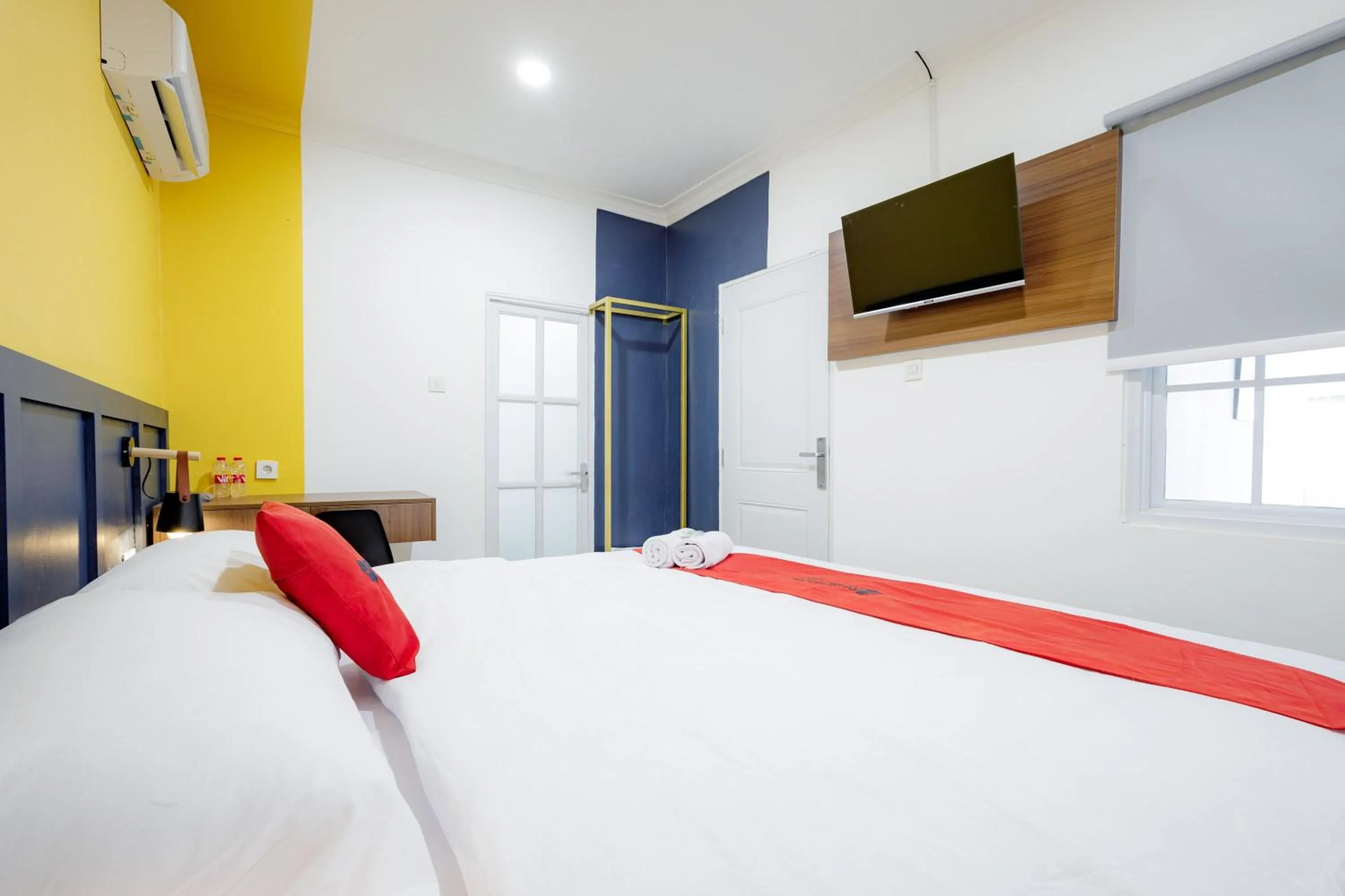 Bed in RedDoorz Plus at Jalan Gatot Subroto Jakarta