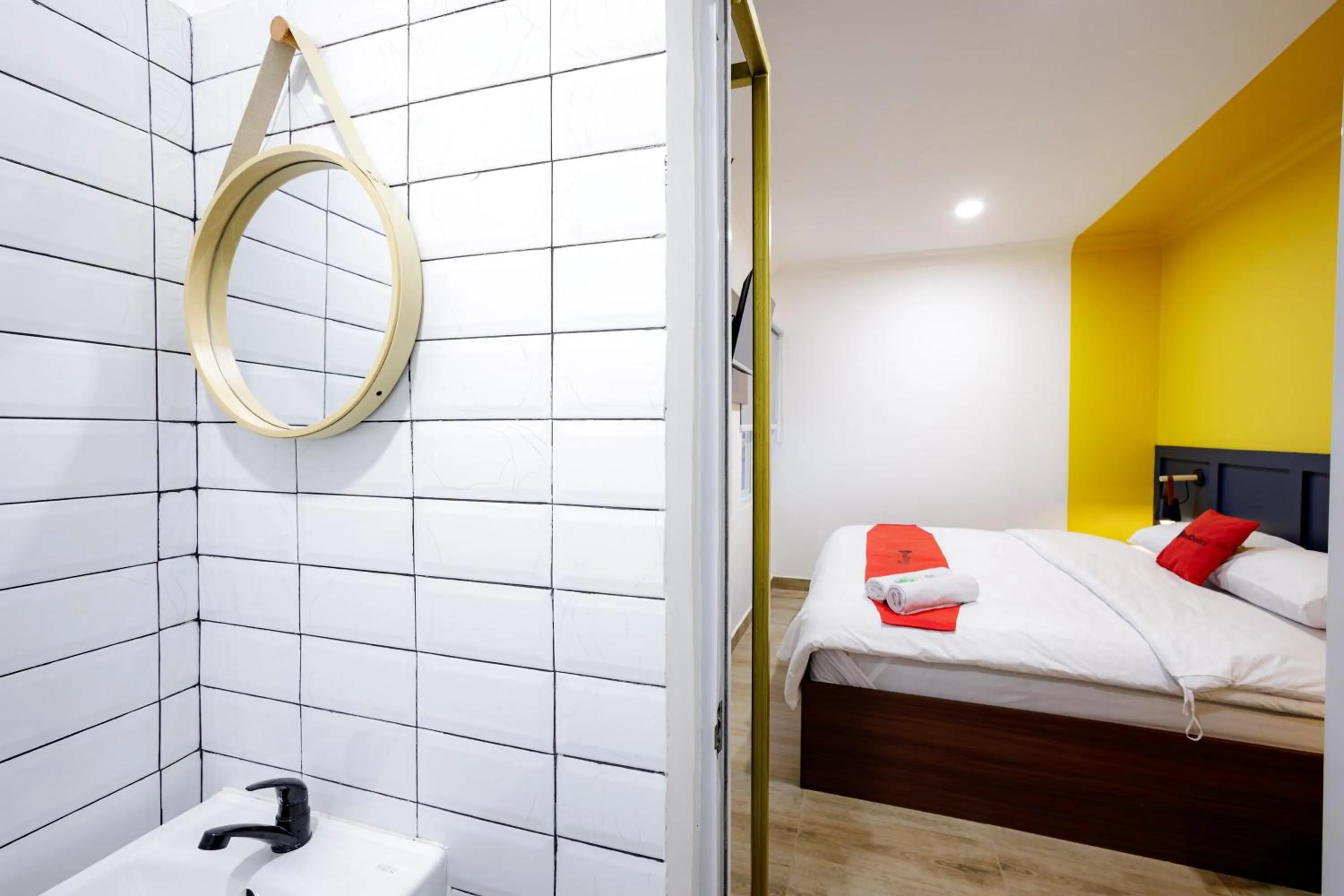 Bed in RedDoorz Plus at Jalan Gatot Subroto Jakarta