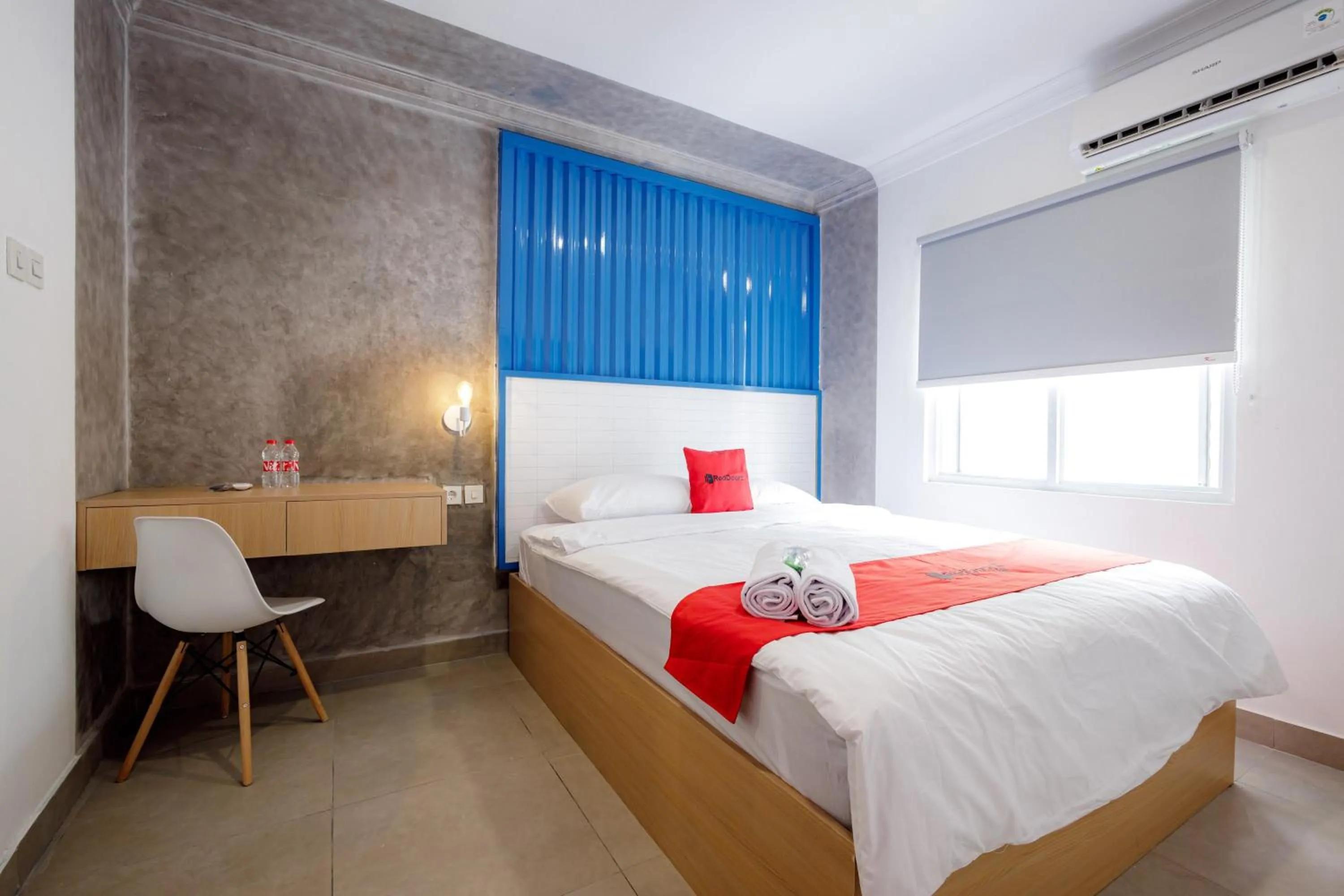 Bed in RedDoorz Plus at Jalan Gatot Subroto Jakarta