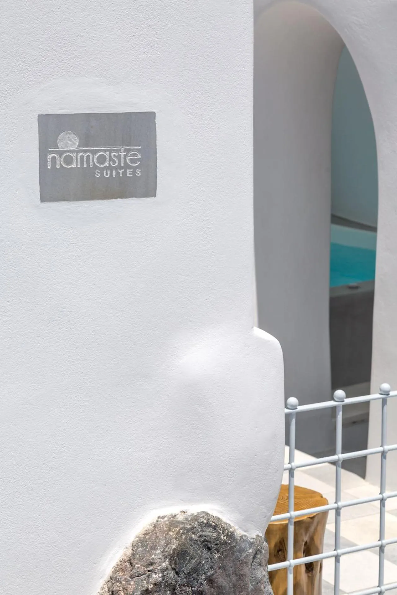 Property logo or sign in Namaste Suites by Oias Local Cavehouses