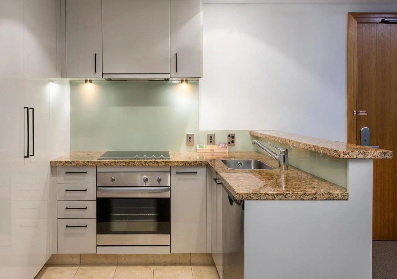 Kitchen or kitchenette in Avani Metropolis Auckland Residences