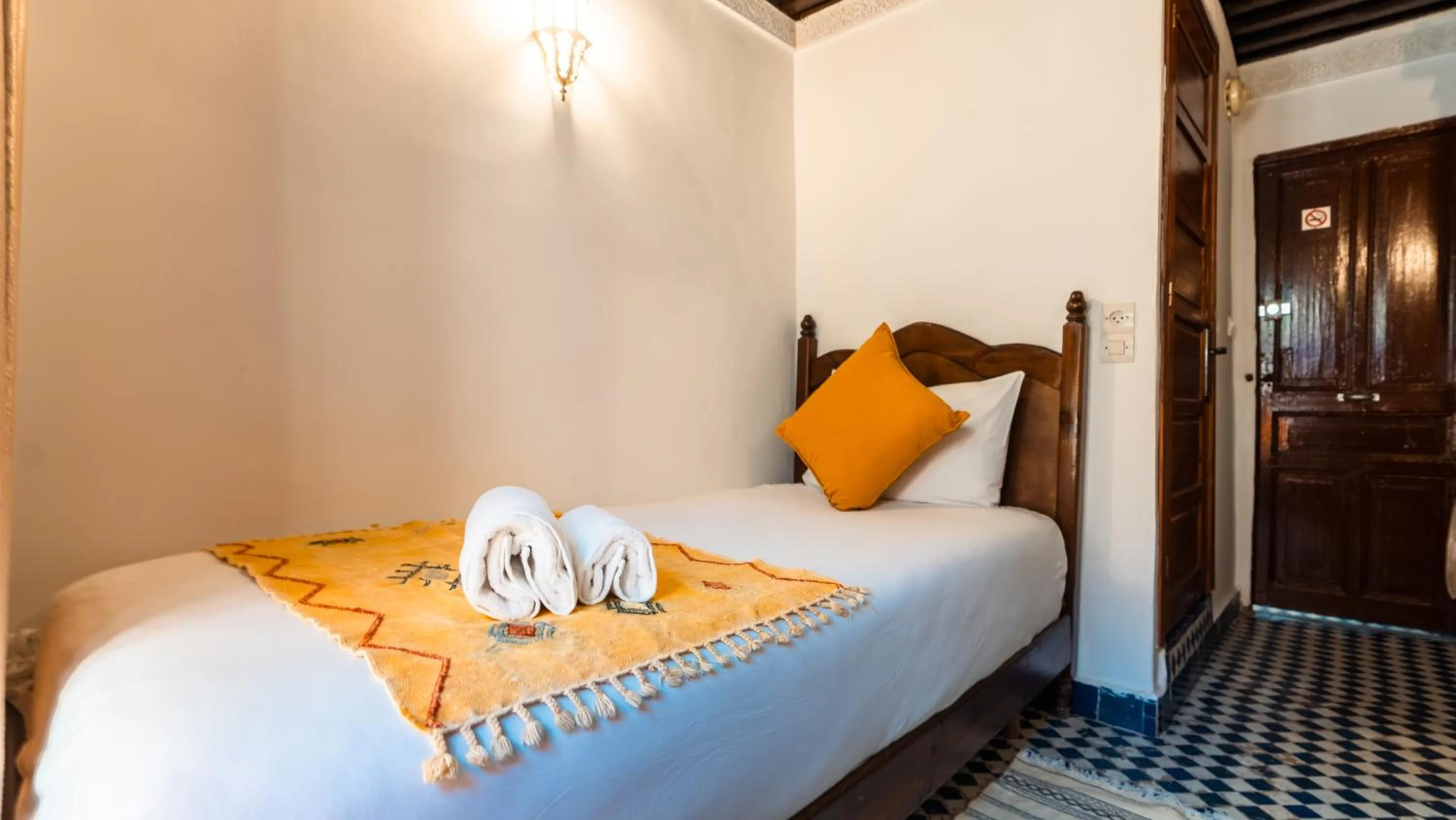 Bed in Riad Alassala Fes