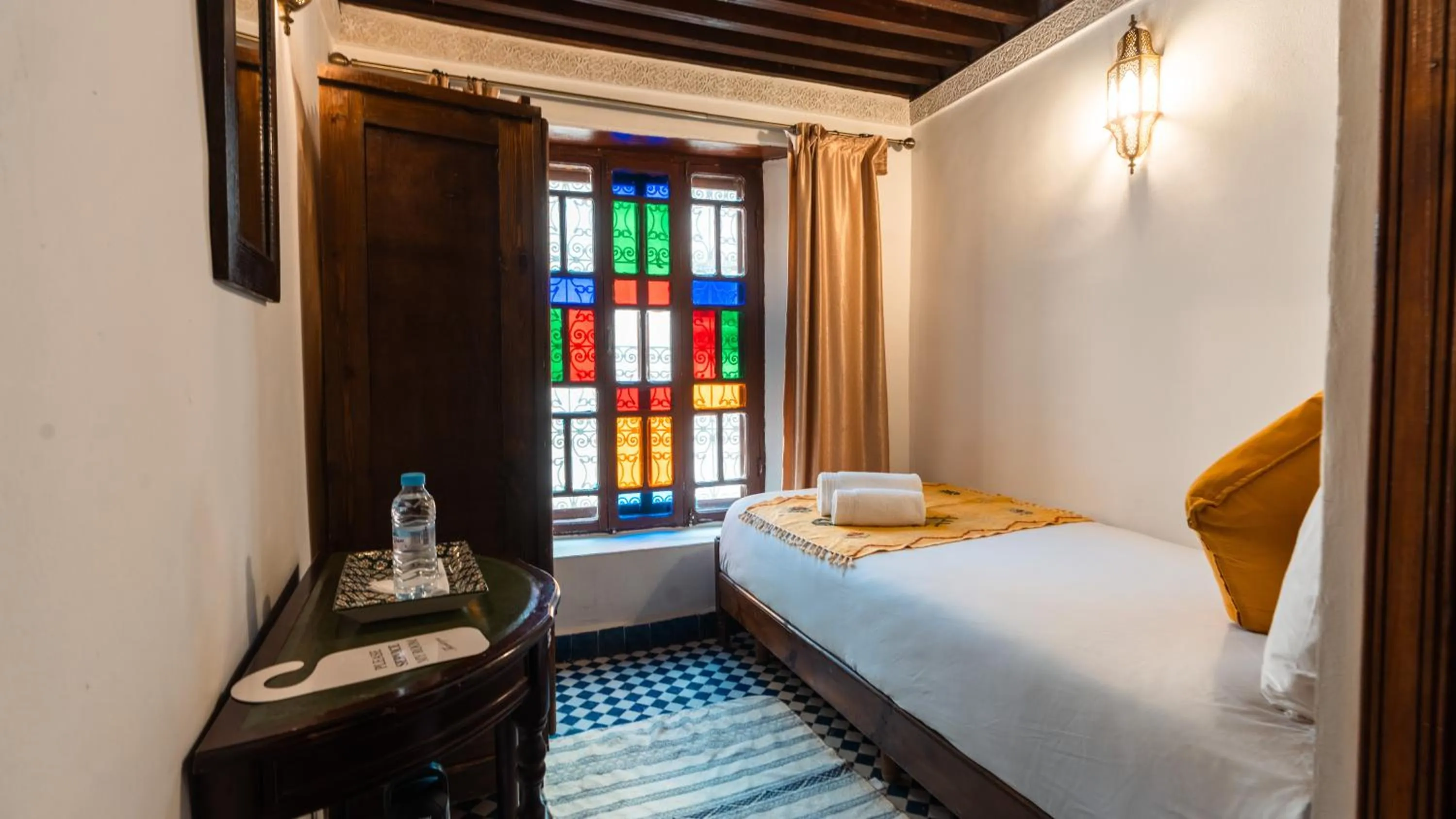 Bed in Riad Alassala Fes