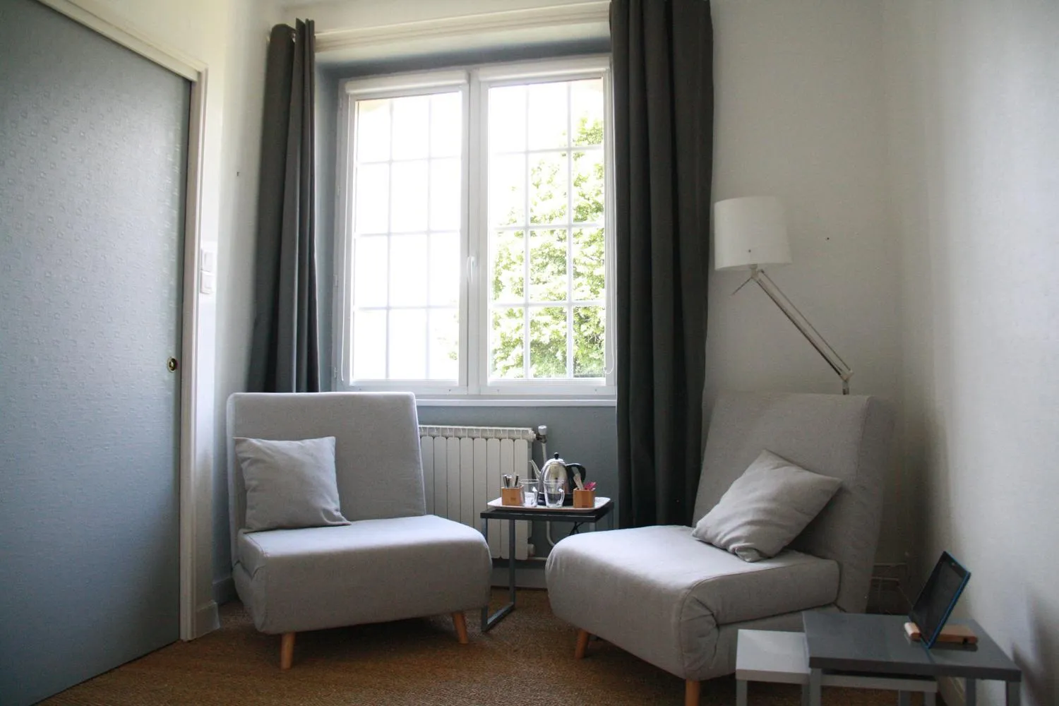 Seating area in Maison Boulvern