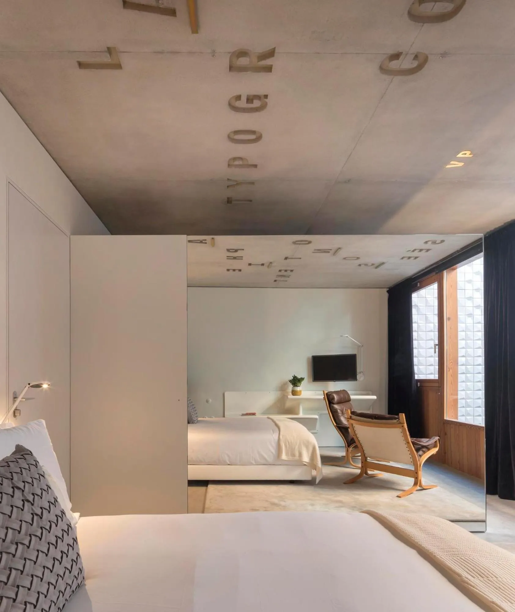 Bed in Hotel Tipografia do Conto by Casa do Conto