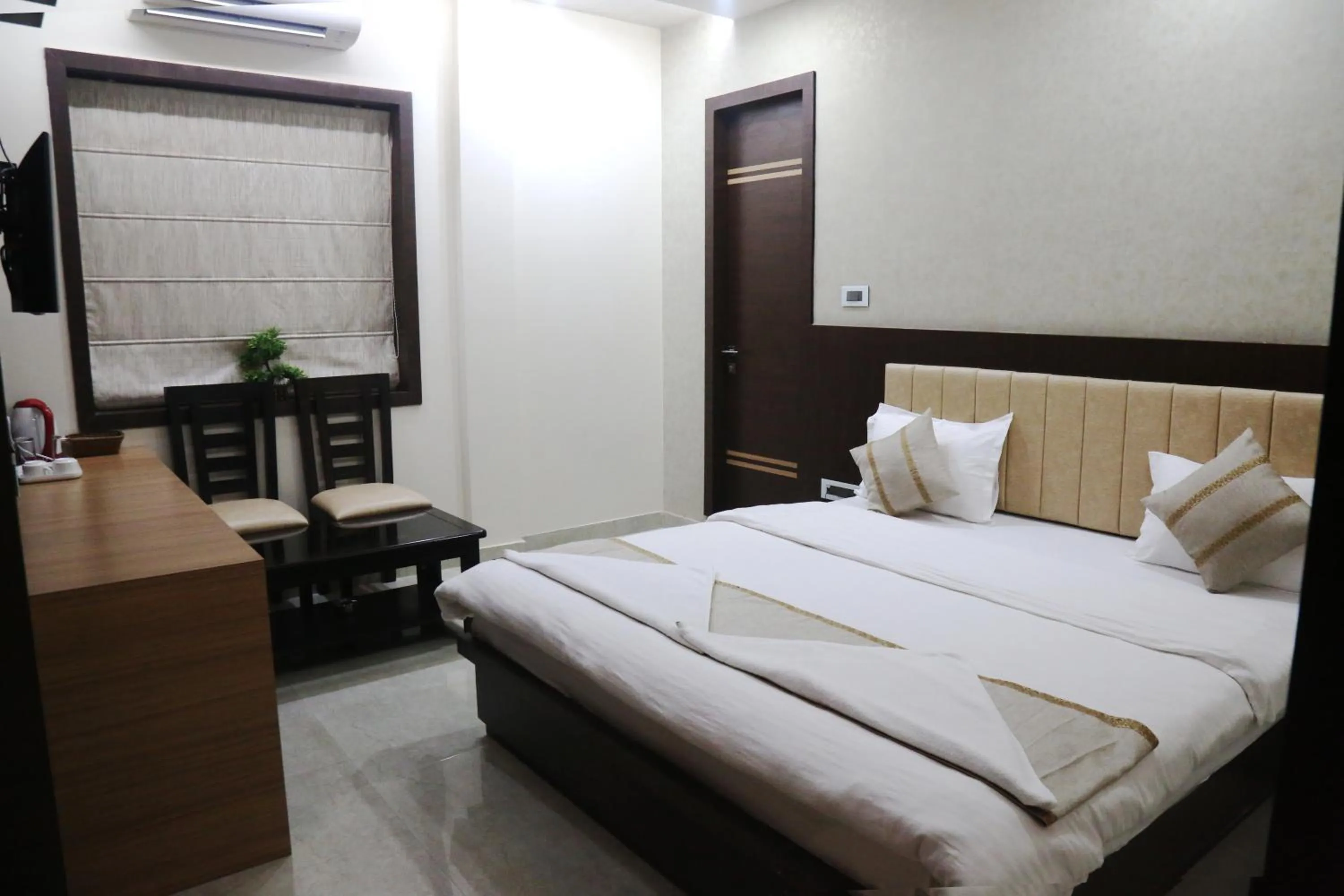 Bedroom in Vandana Residency