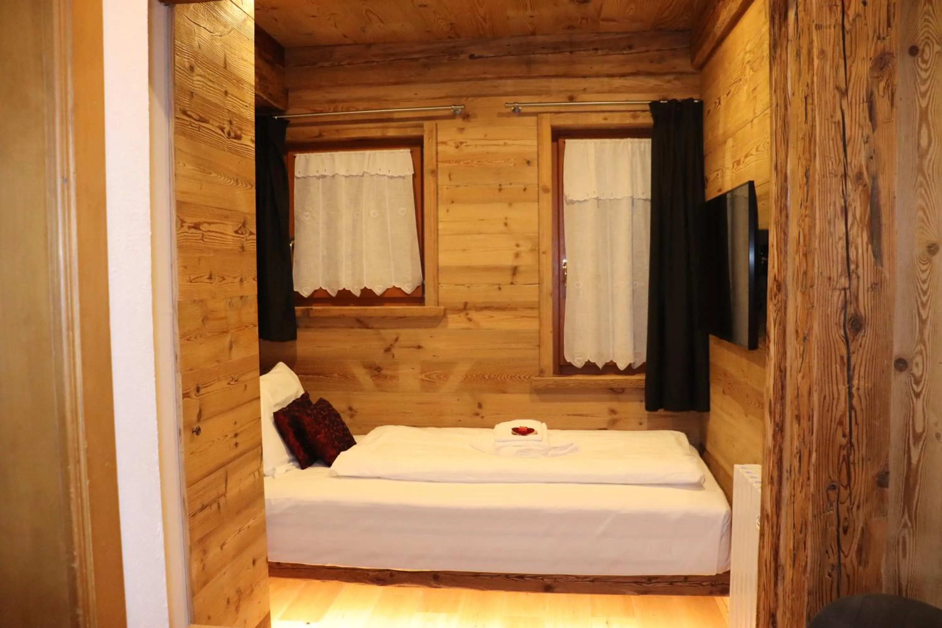 Bed in Hotel Ciasa Lorenzi