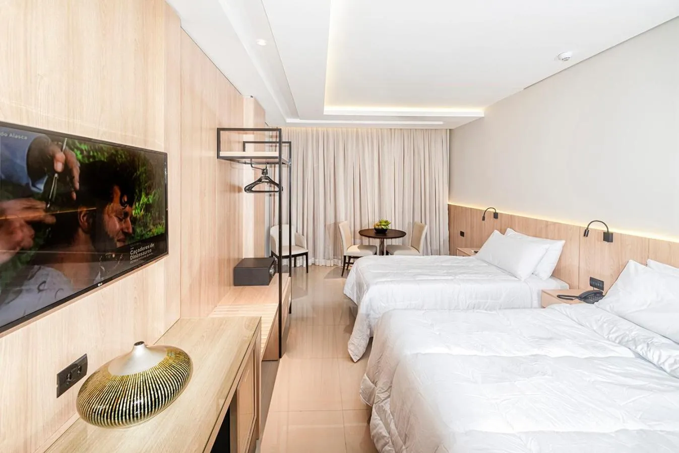 Bed in Rafain Palace Hotel & Convention Center