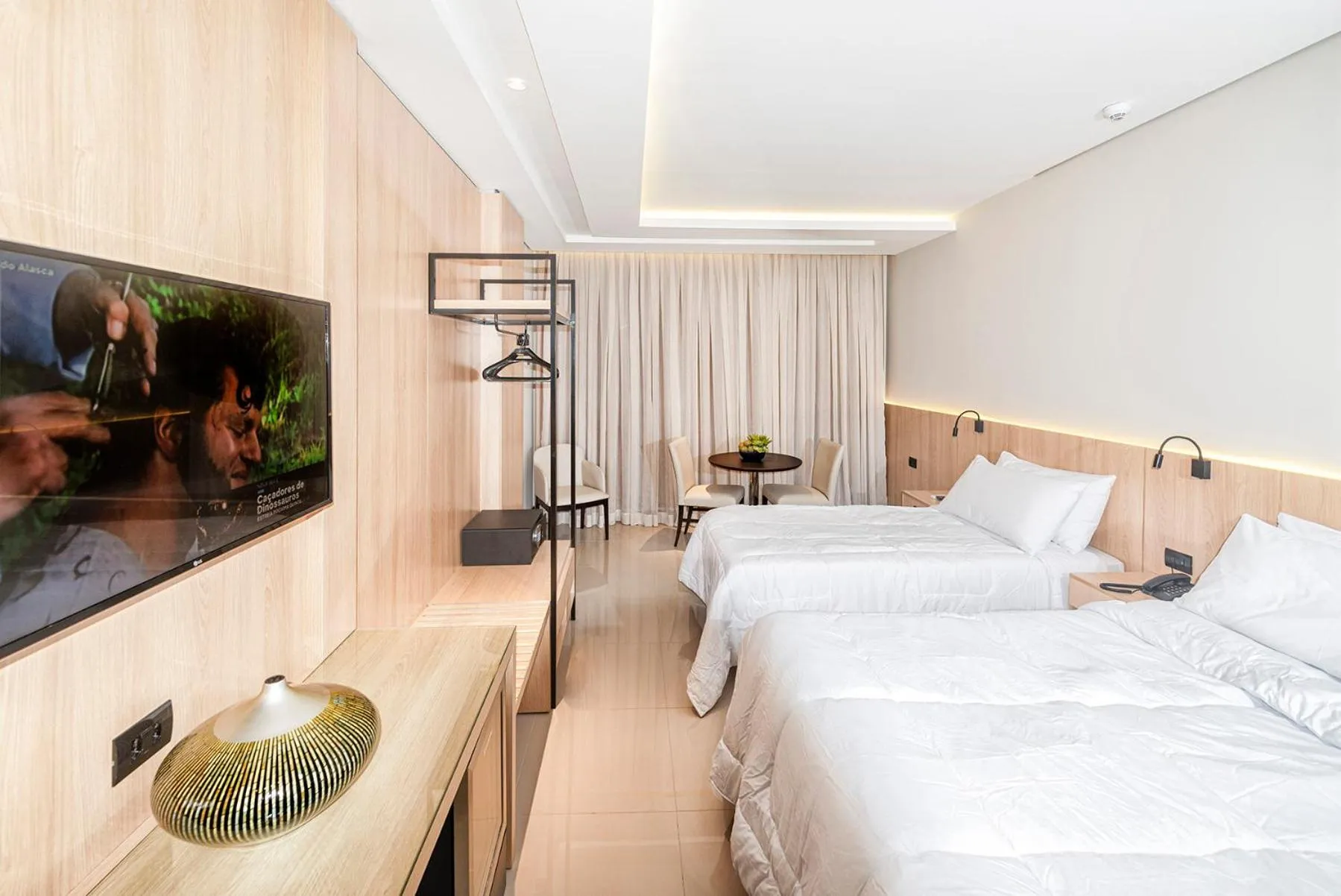 Bed in Rafain Palace Hotel & Convention Center