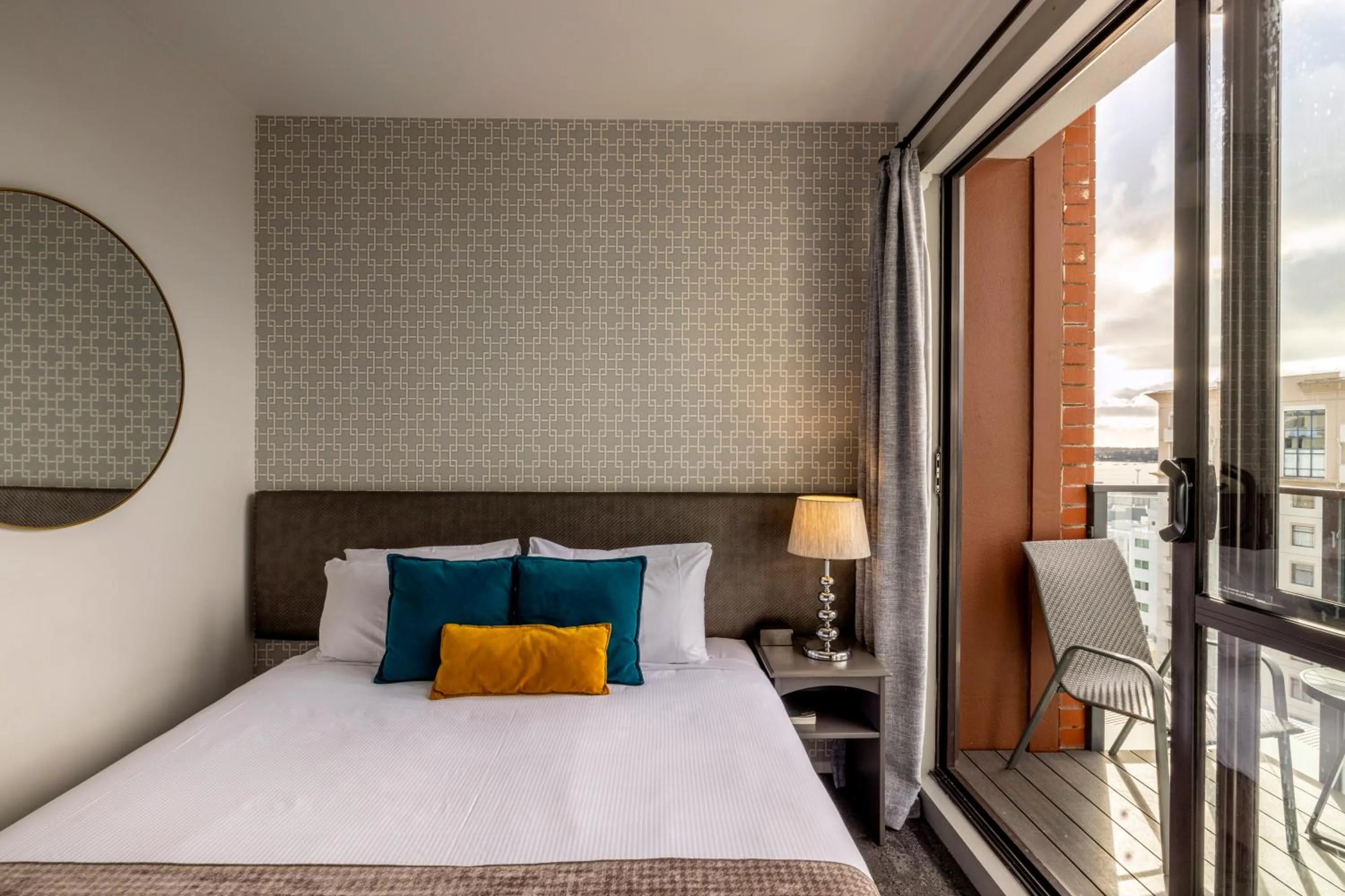 Balcony/Terrace, Bed in Quest on Eden Auckland CBD Apartment Hotel