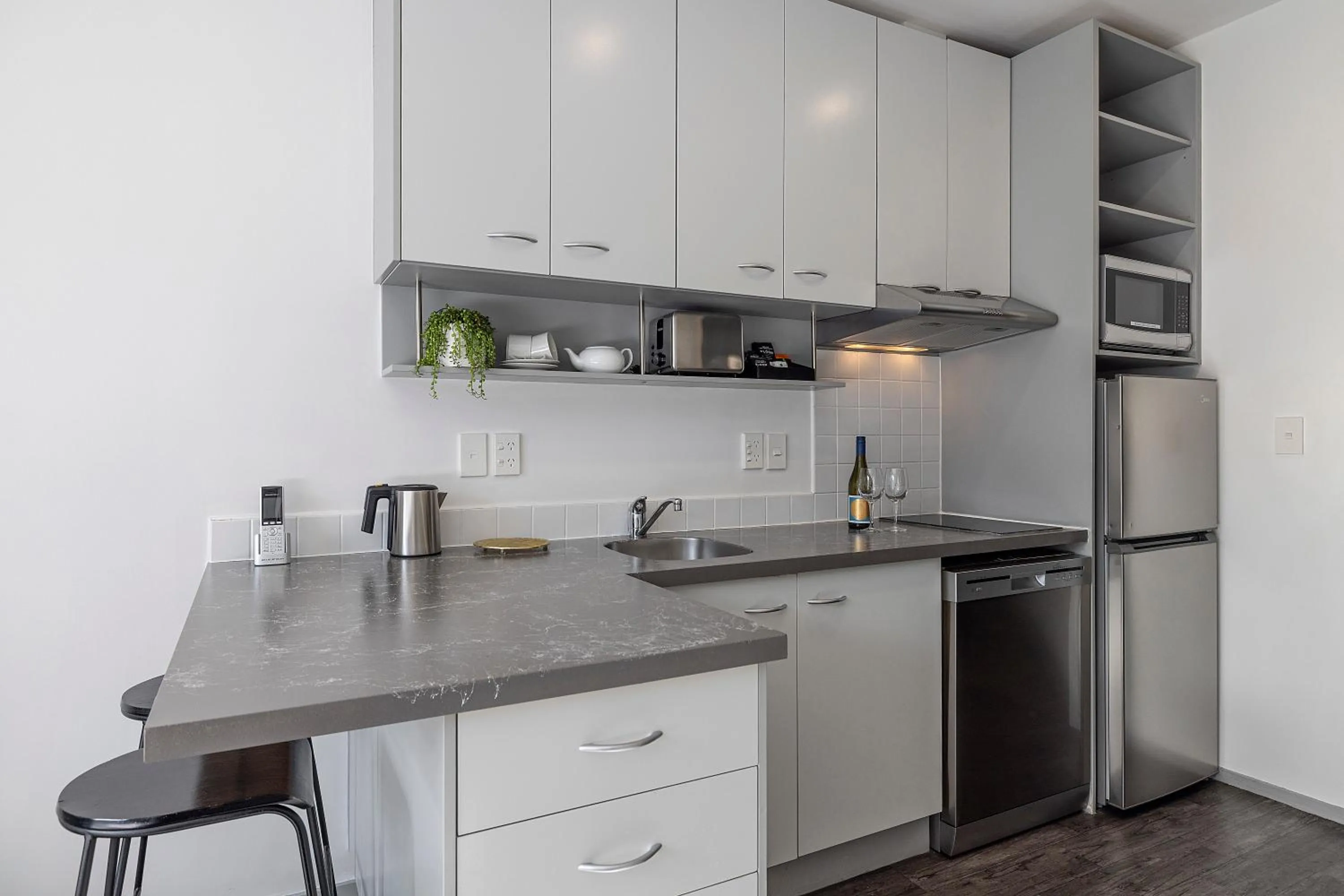 kitchen in Quest on Eden Auckland CBD Apartment Hotel