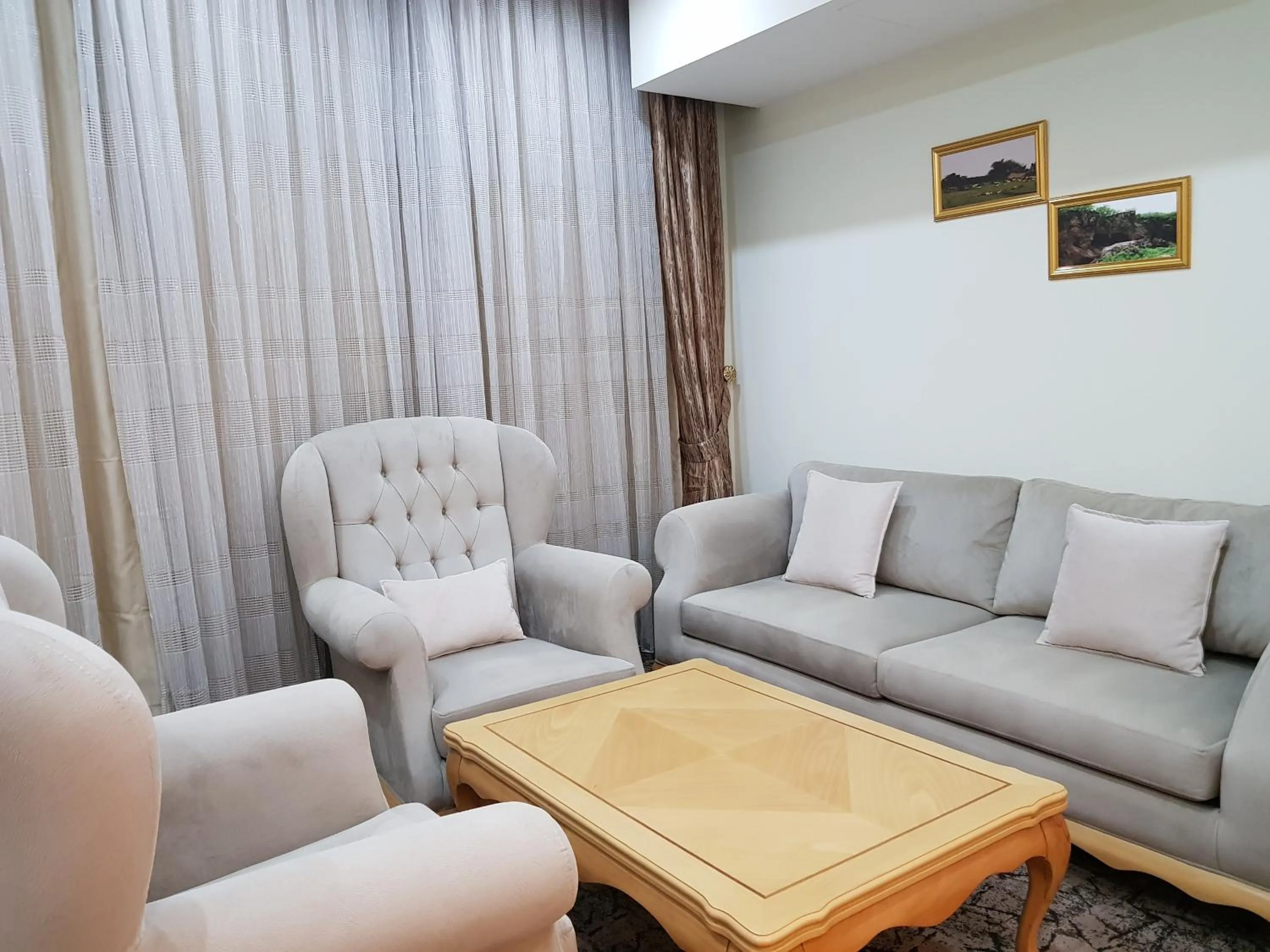 Seating area in Muscat Plaza Hotel