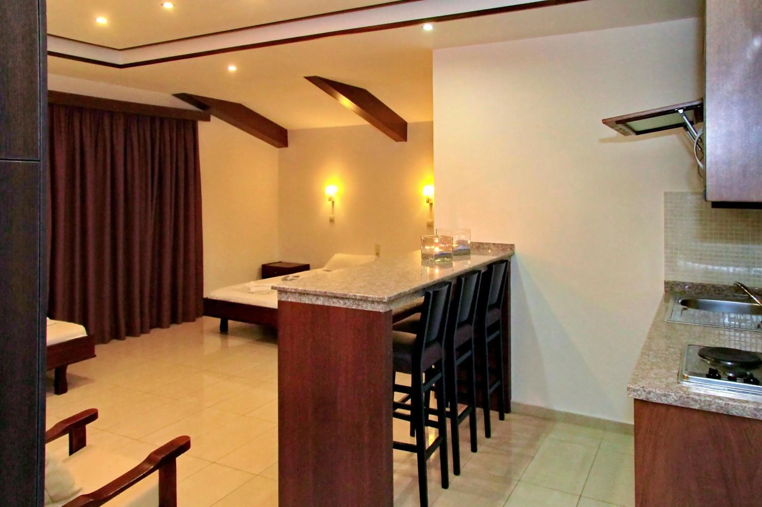 Kitchen or kitchenette in 24 Seven Boutique Hotel