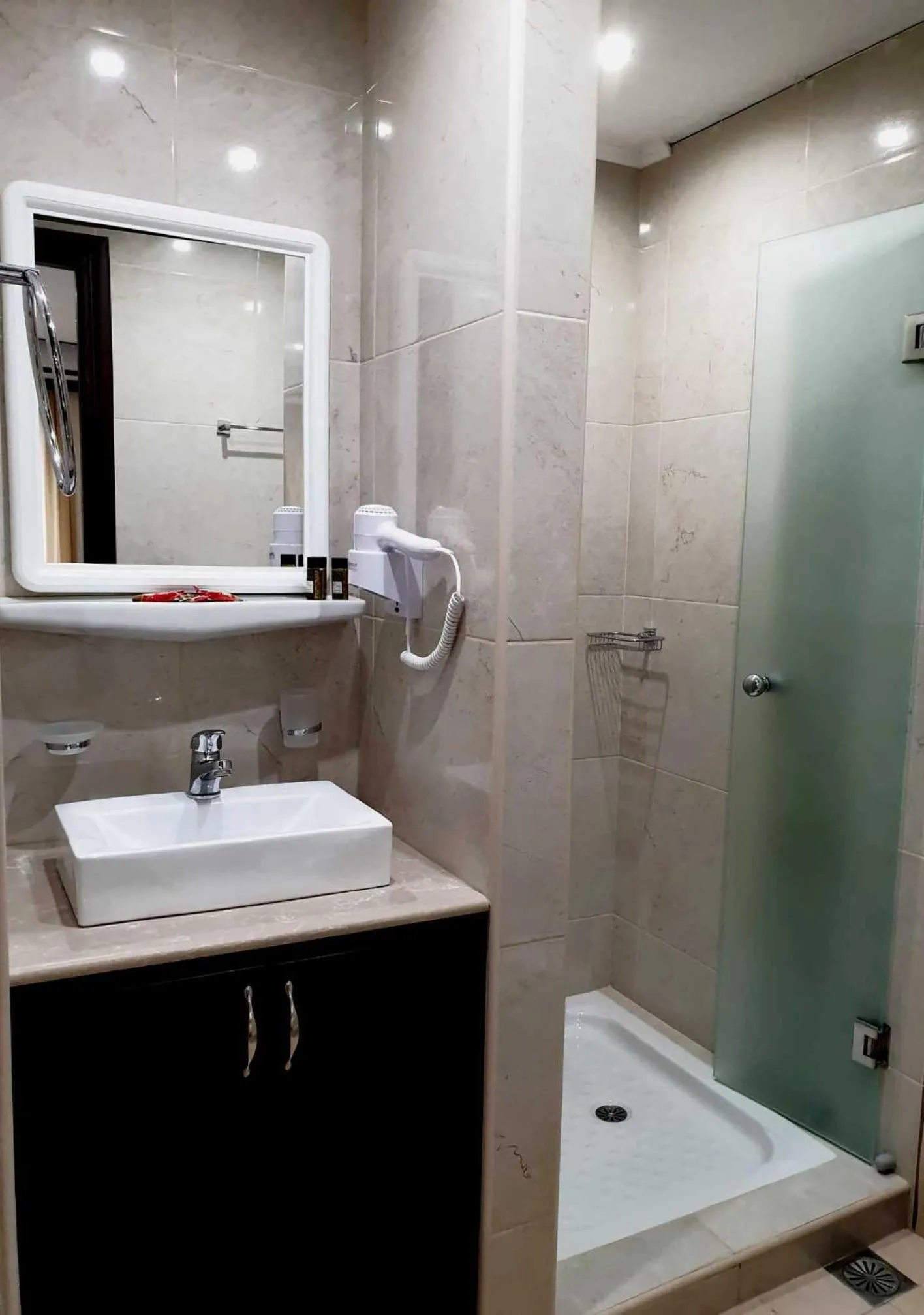 Shower in 24 Seven Boutique Hotel