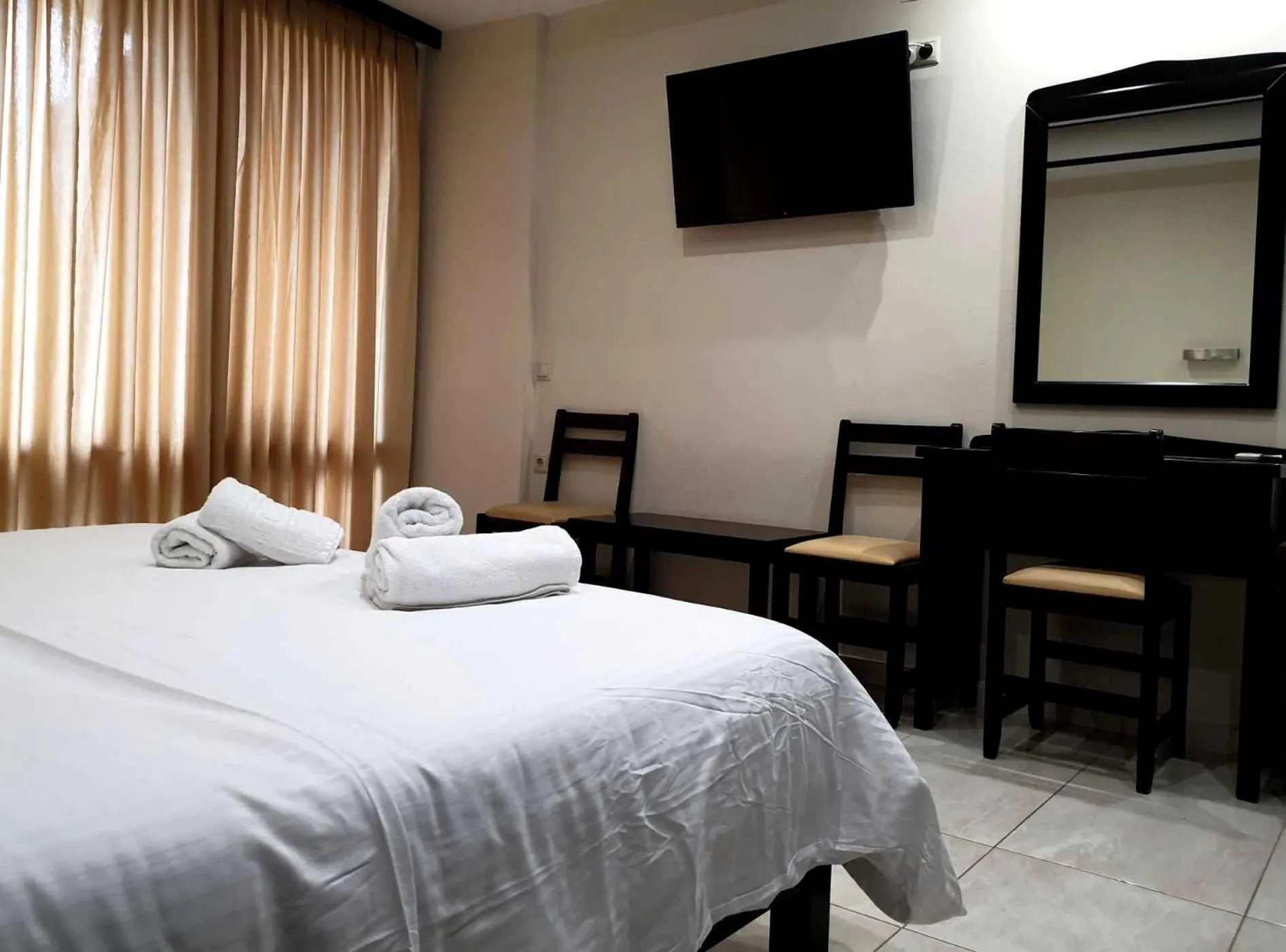 Bed in 24 Seven Boutique Hotel