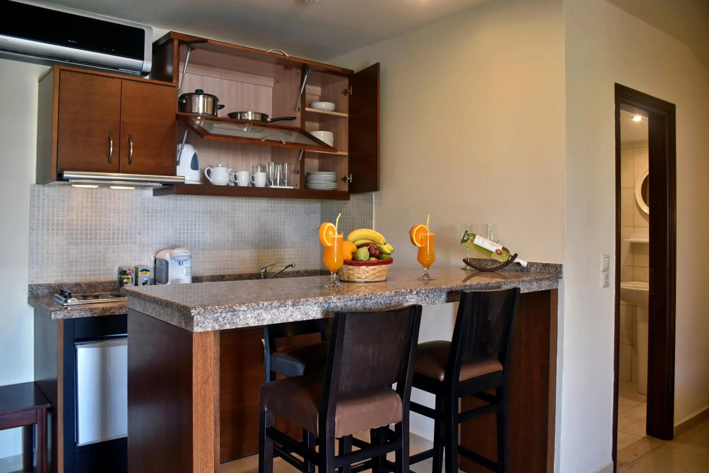 Kitchen or kitchenette in 24 Seven Boutique Hotel