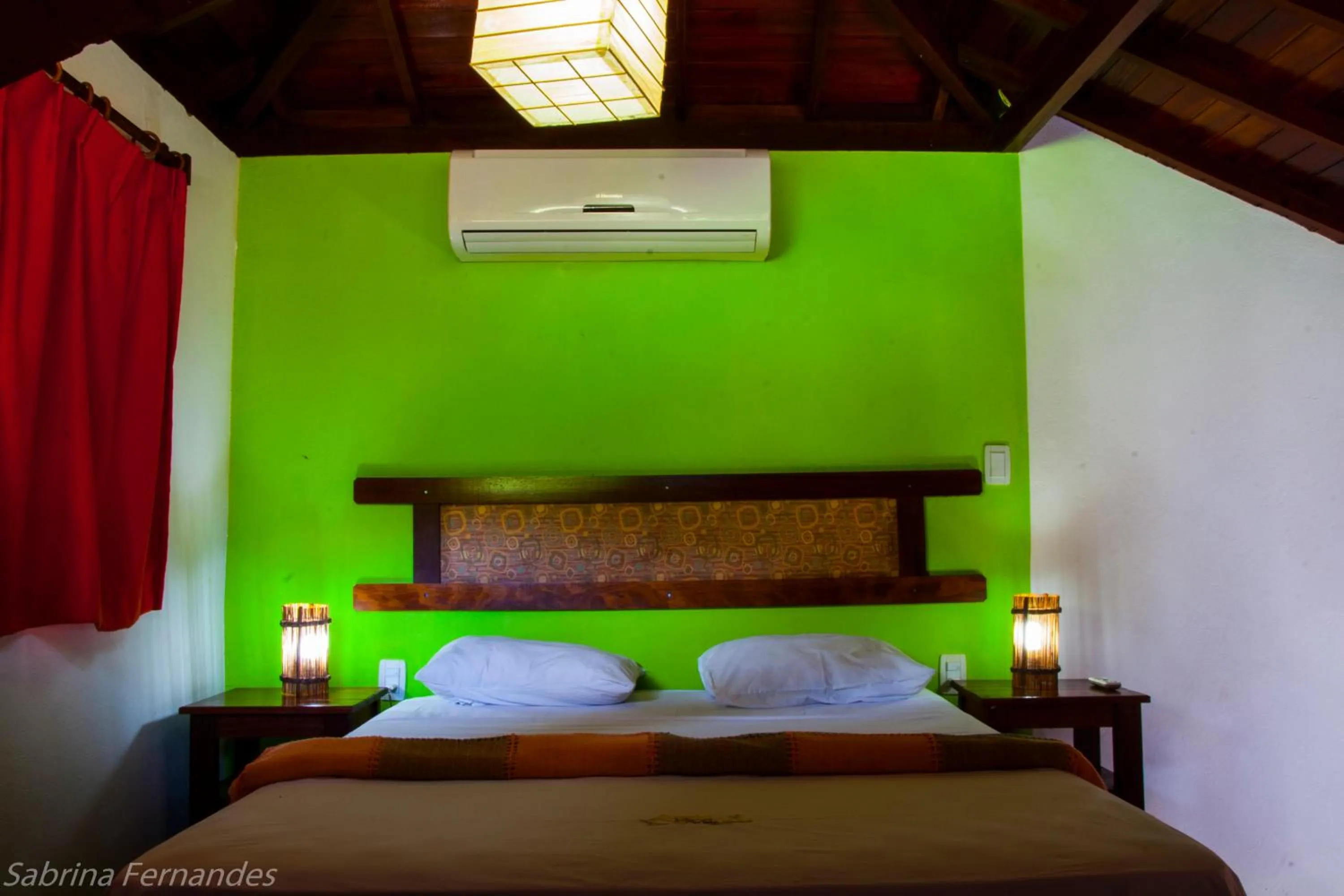 Text overlay, Bed in Areia Branca Apart Hotel