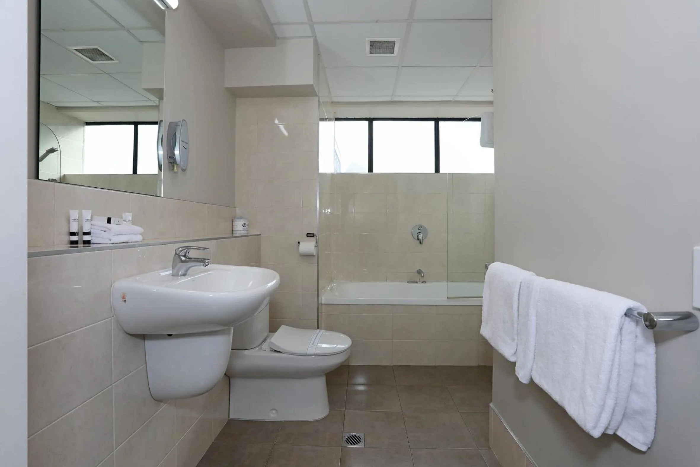 Bathroom in Quality Suites Central Square