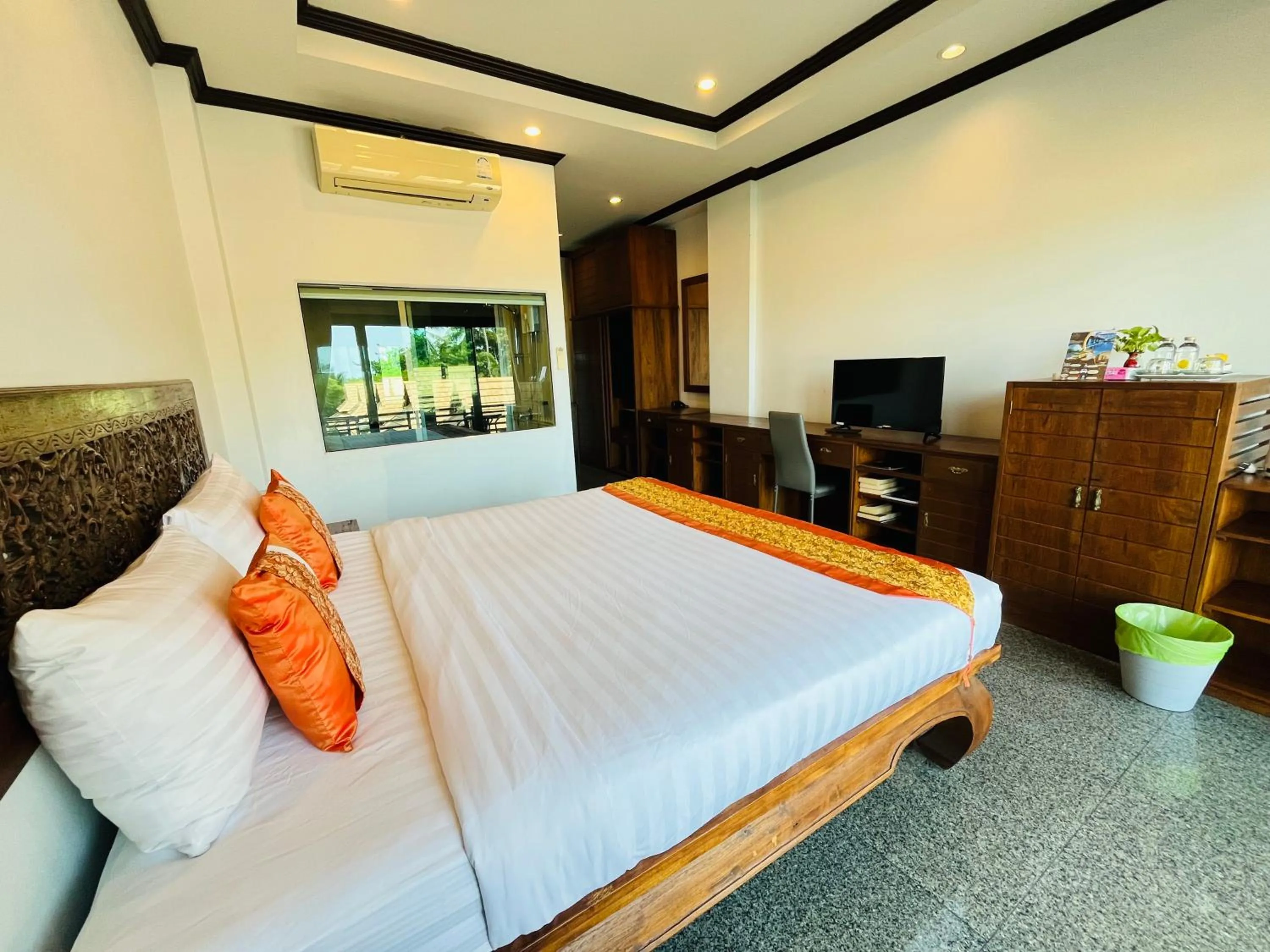 Photo of the whole room, Bed in Poolsawat Villa - SHA Plus