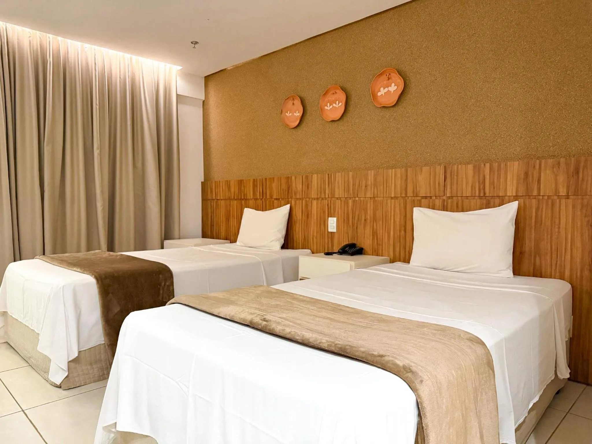 Bedroom, Bed in Vivence Suítes Hotel Palmas