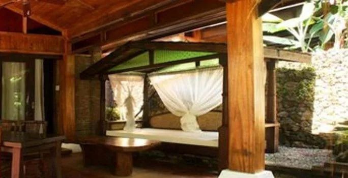 Seating area, Bed in Chema's by the Sea