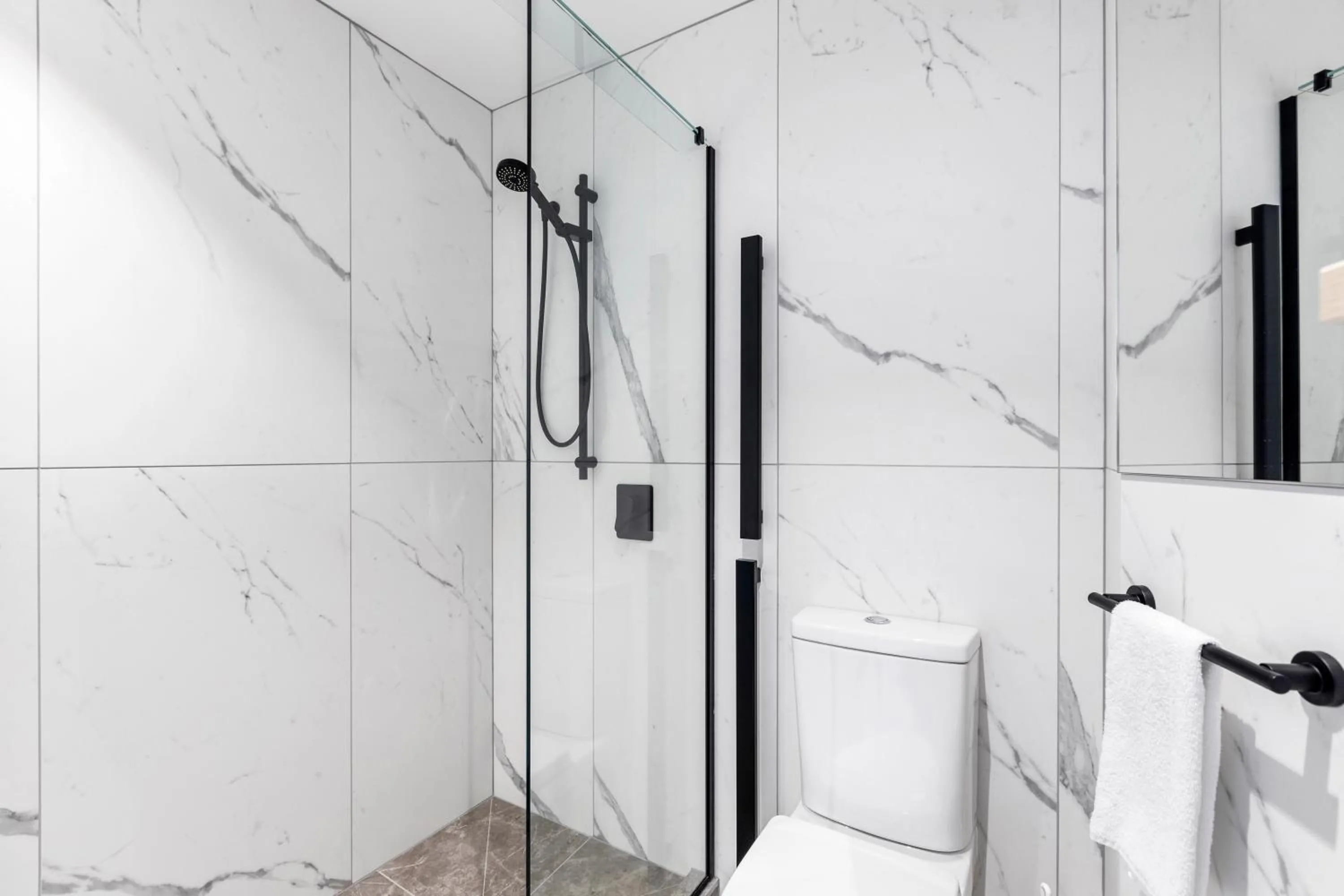 Shower in Legacy Airedale Hotel Auckland