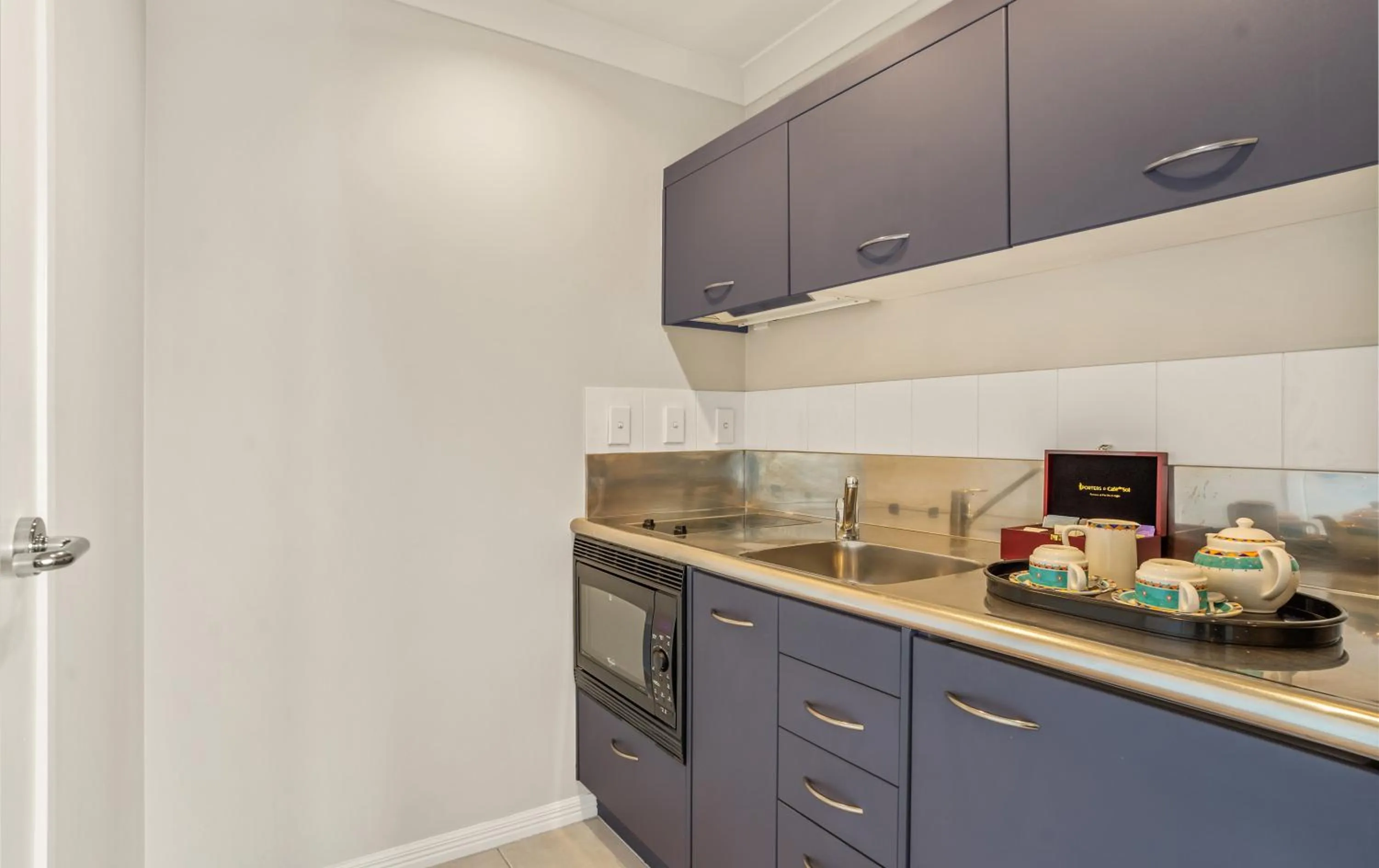 Kitchen or kitchenette in Parkside Hotel & Apartments
