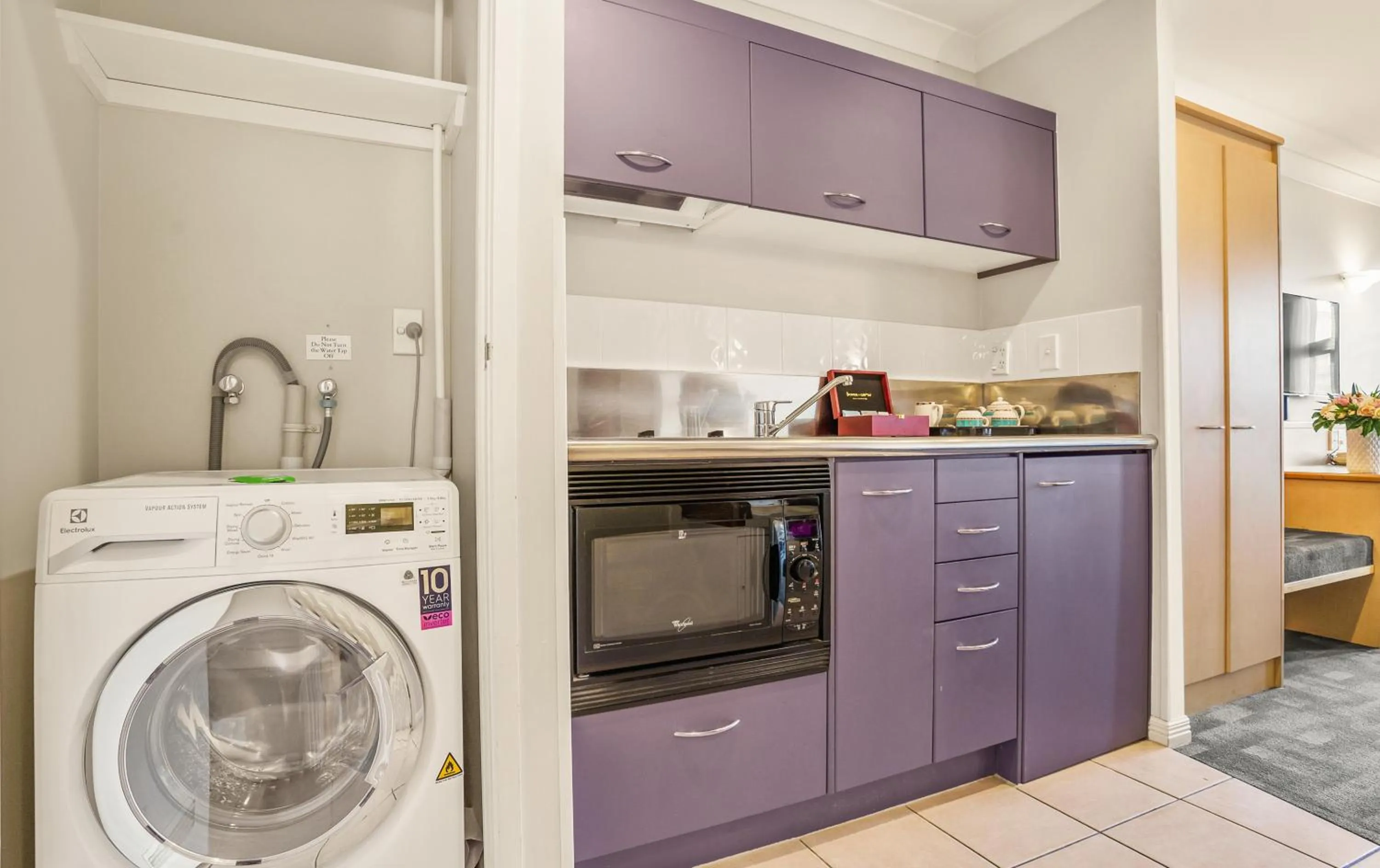 Kitchen or kitchenette in Parkside Hotel & Apartments