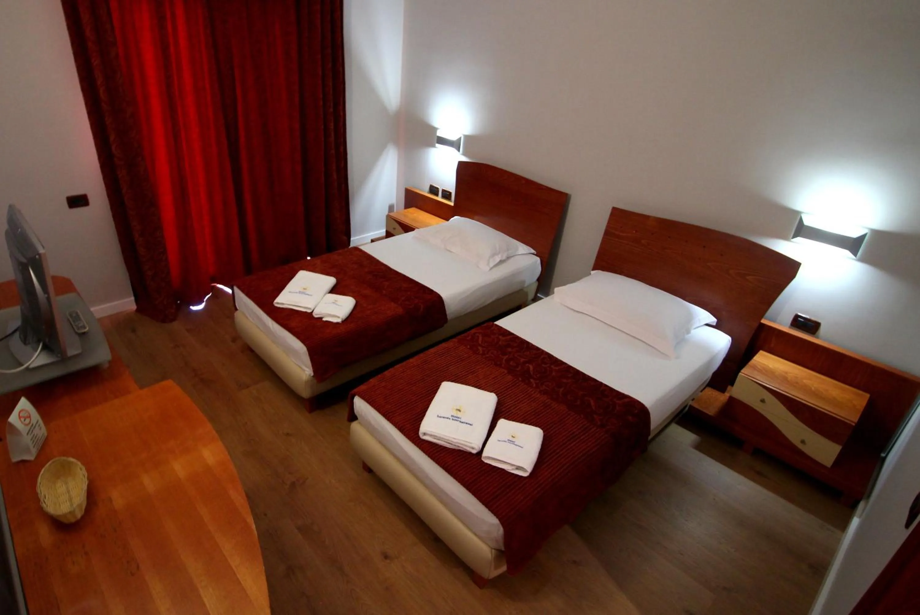 Bed in Hotel Saranda International